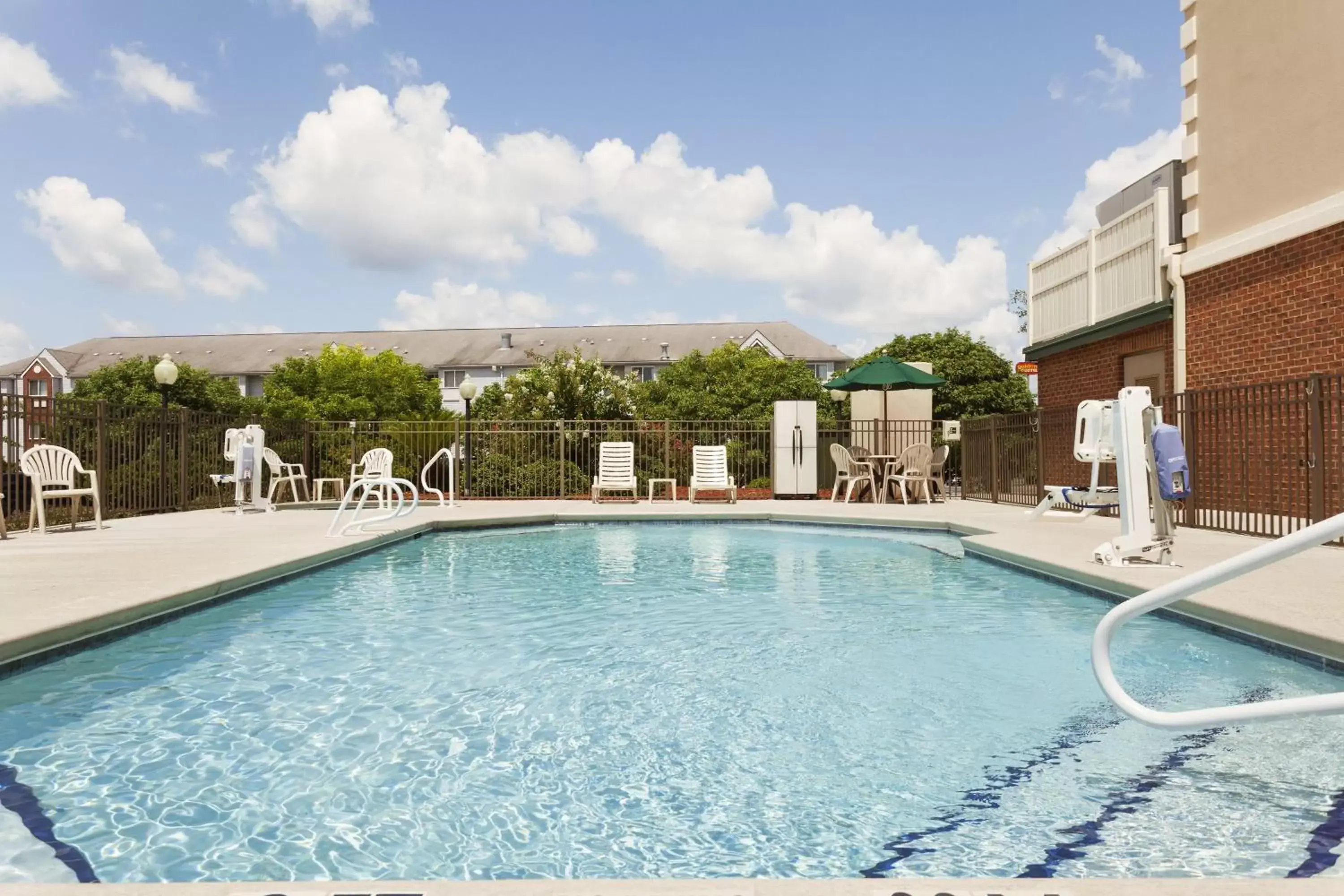 Swimming Pool in Country Inn & Suites by Radisson, Tifton, GA