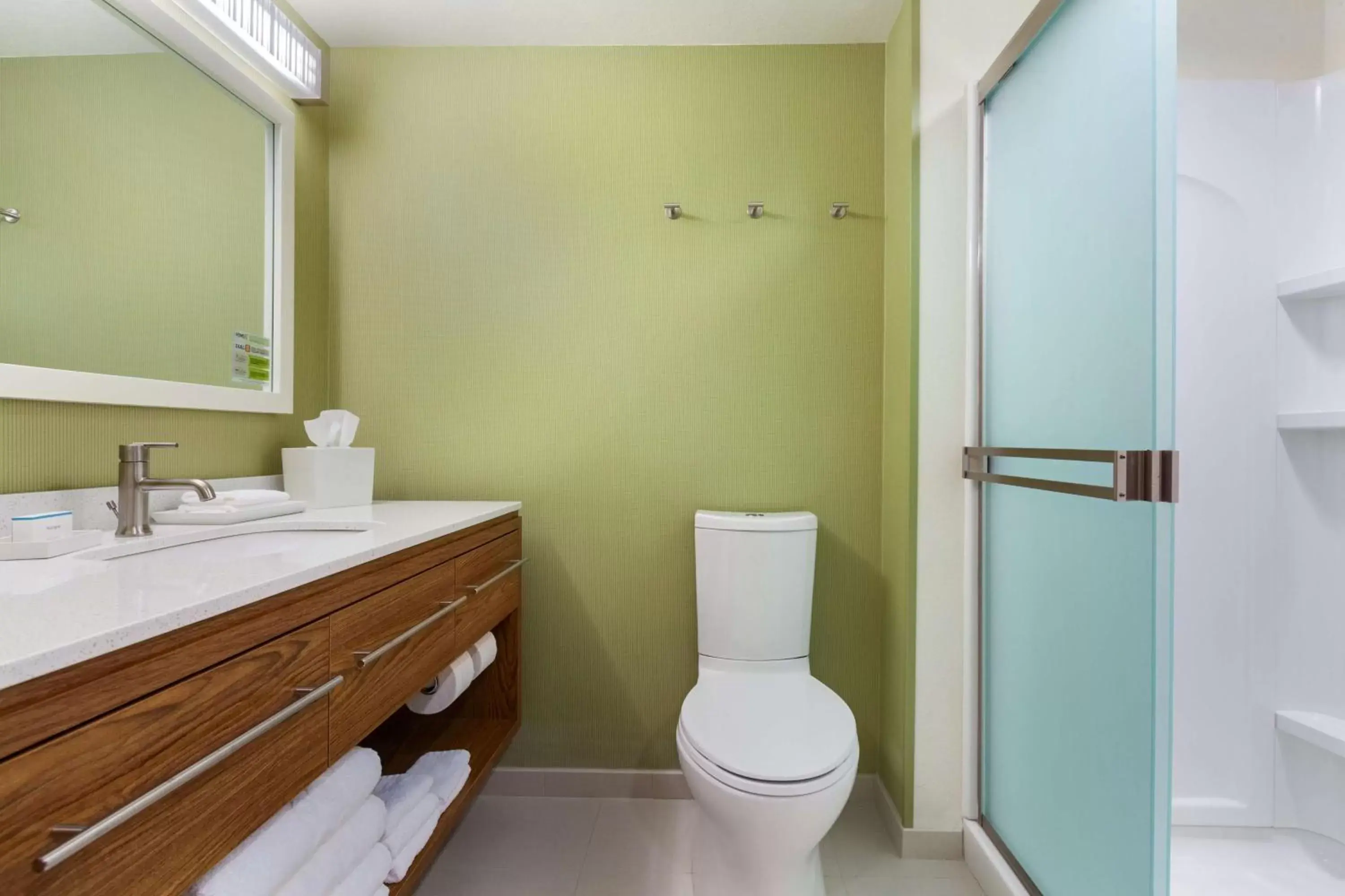 Bathroom in Home2 Suites by Hilton Champaign/Urbana Bathroom in Home2 Suites by Hilton Champaign/Urbana