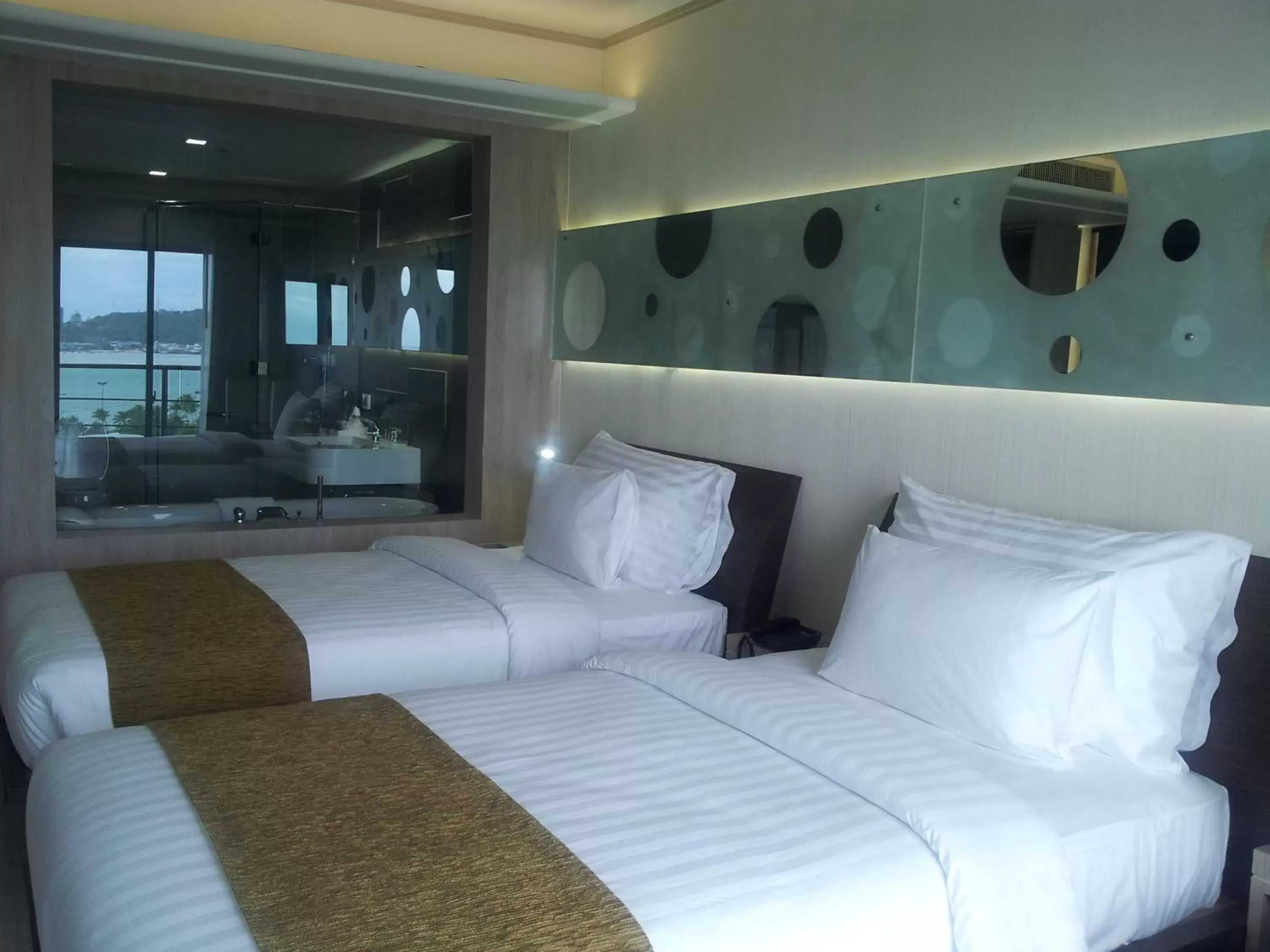 Bed in Pattaya Discovery Beach Hotel - SHA Extra Plus