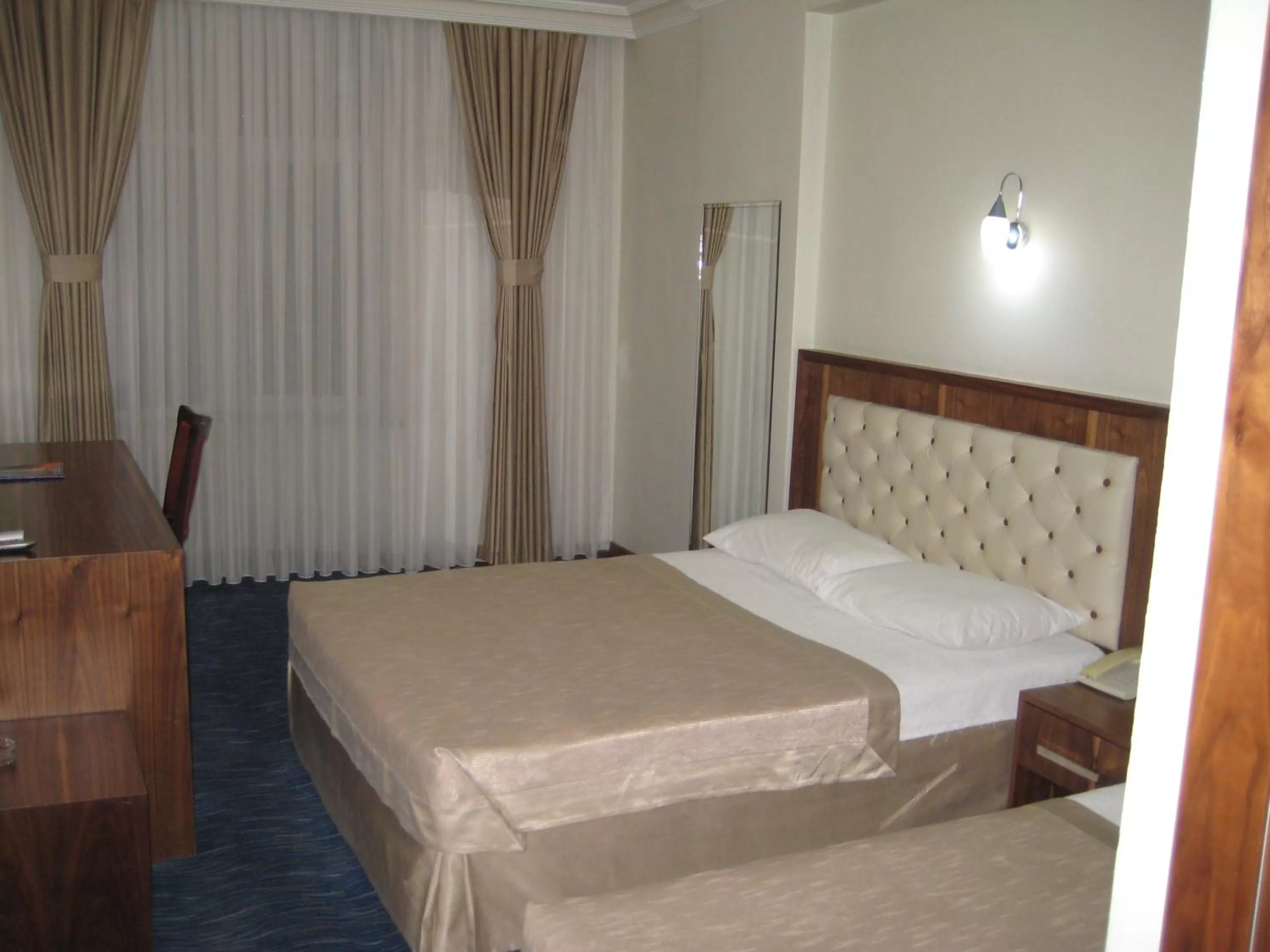 TV and multimedia, Bed in Miroglu Hotel