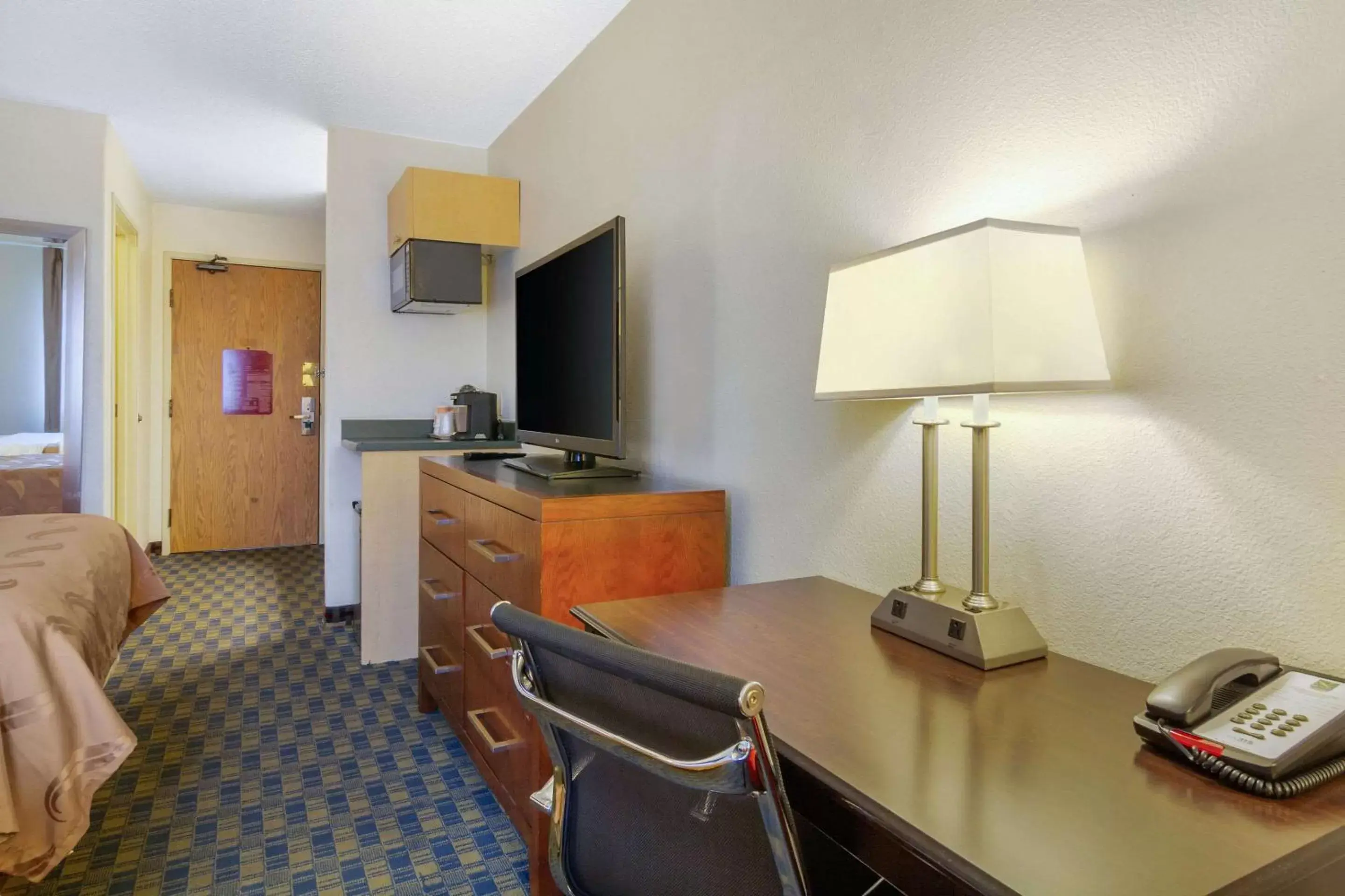 Photo of the whole room, TV/Entertainment Center in Quality Inn & Suites Lakewood - Denver Southwest