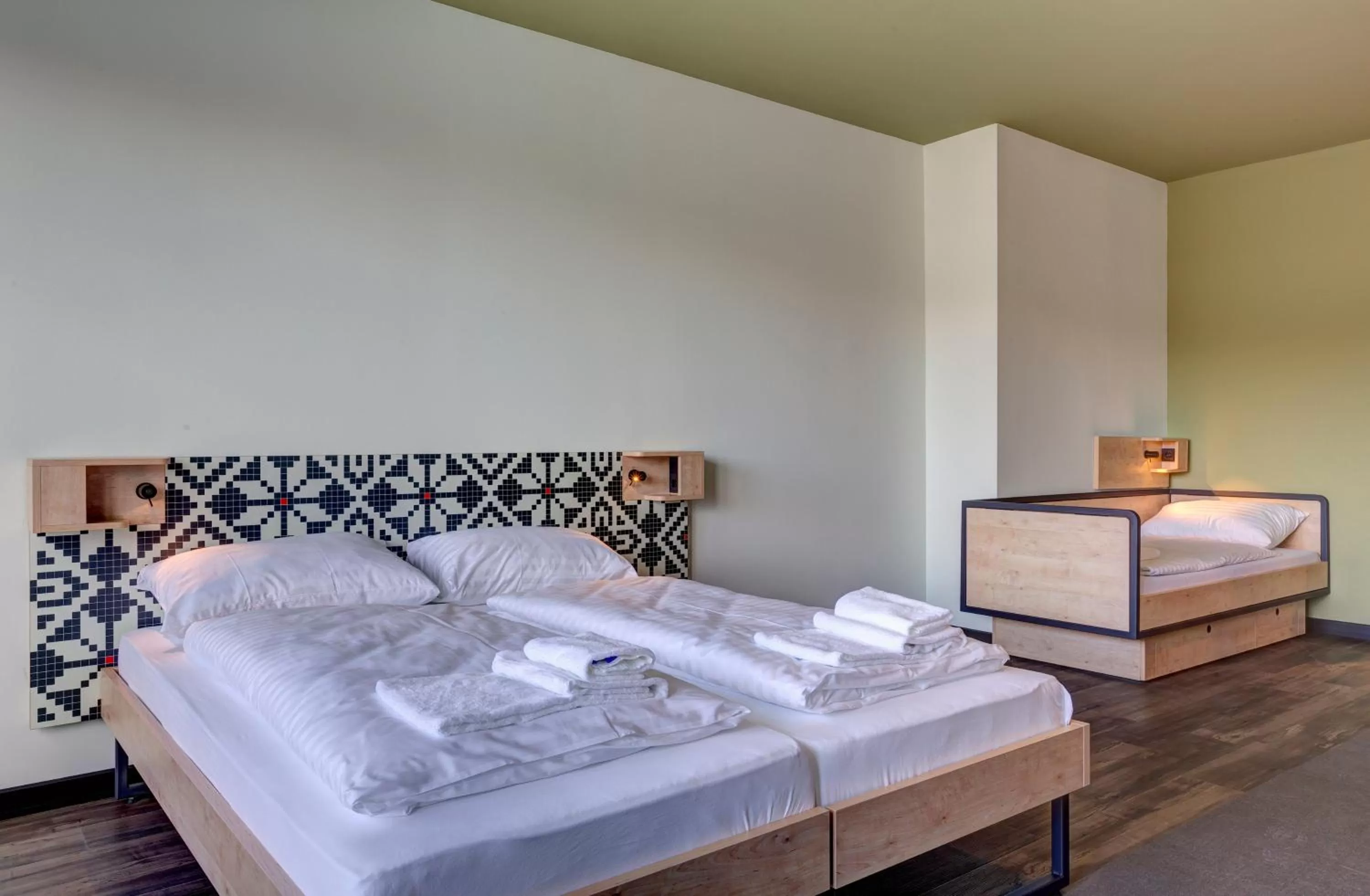 Photo of the whole room, Bed in MEININGER Budapest Great Market Hall