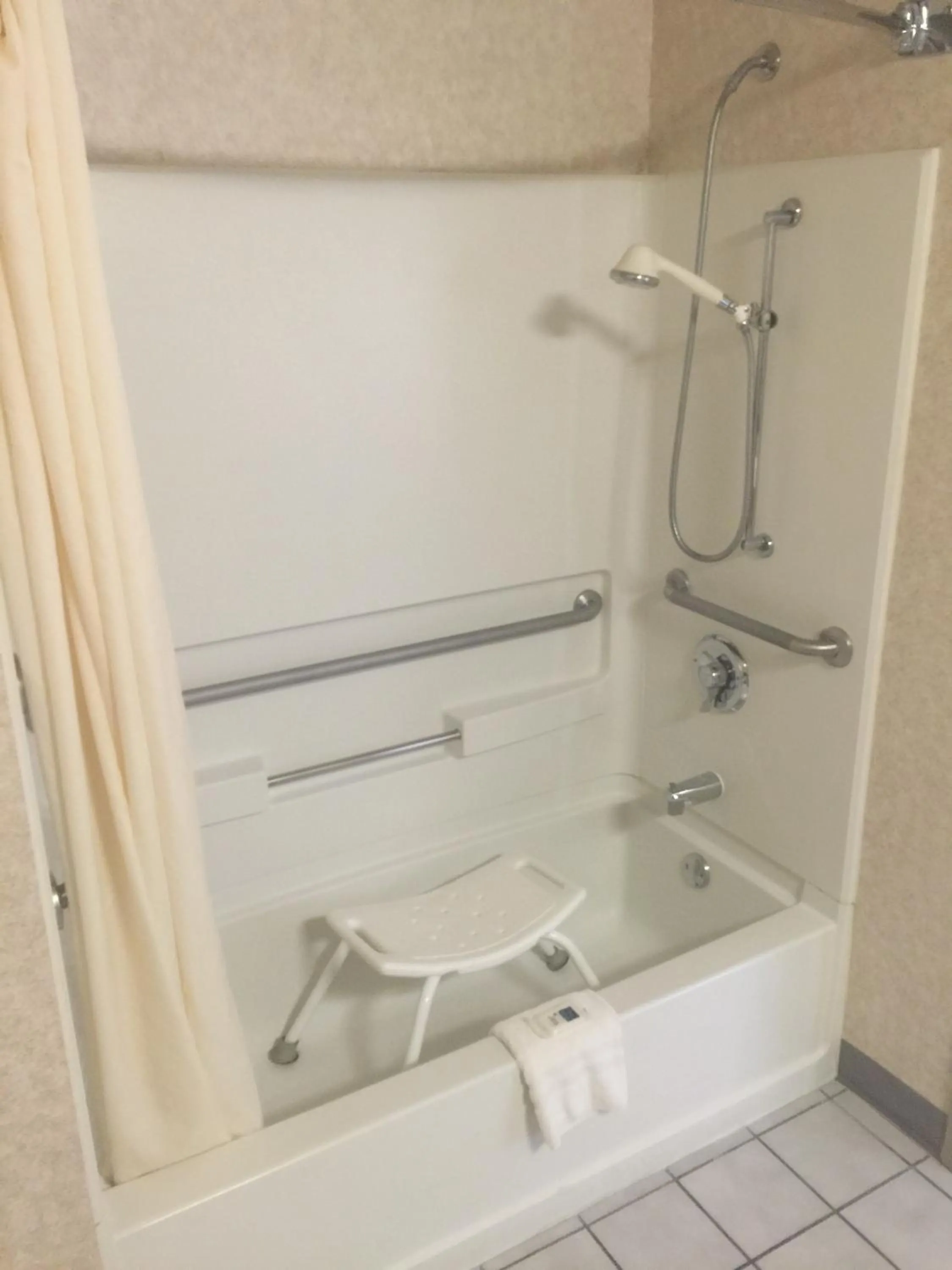 Bathroom in AmericInn by Wyndham Salina