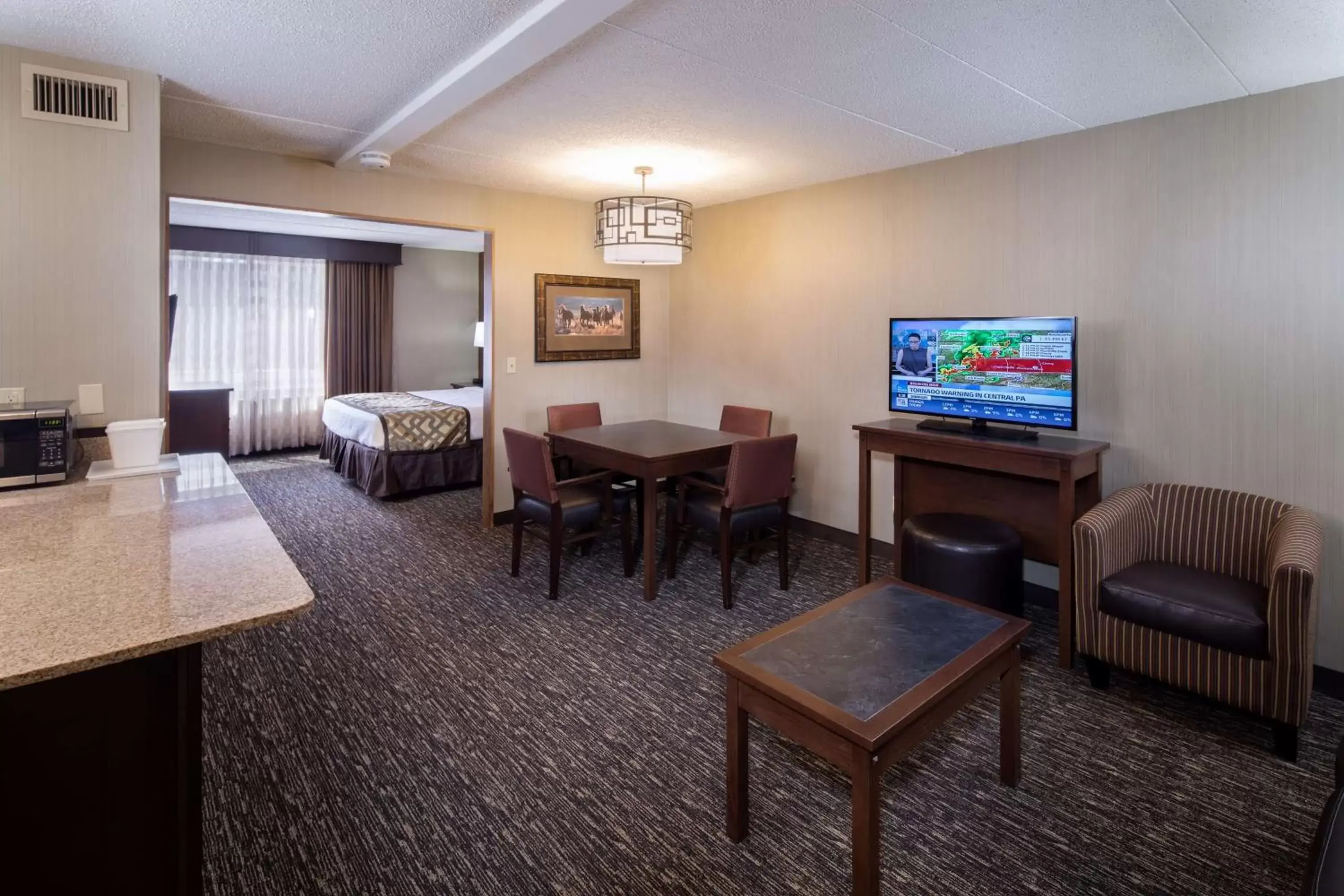 Photo of the whole room, Seating Area in Best Western Ramkota Hotel