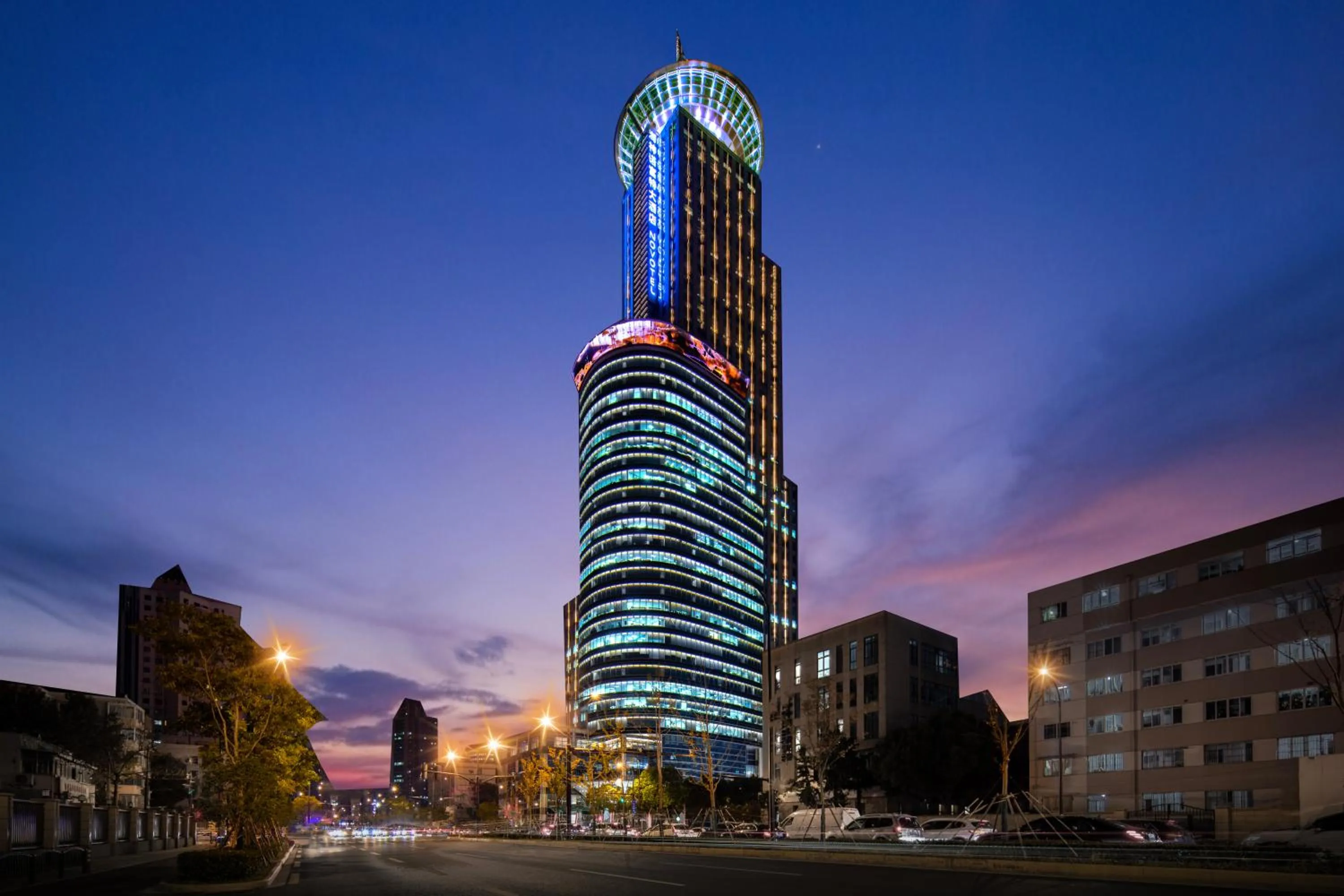 Property building in Novotel Atlantis Shanghai - Enjoy our great-valued breakfast in our rooftop revolving restaurant with a stunning river view & utilize our FREE self-serviced laundry