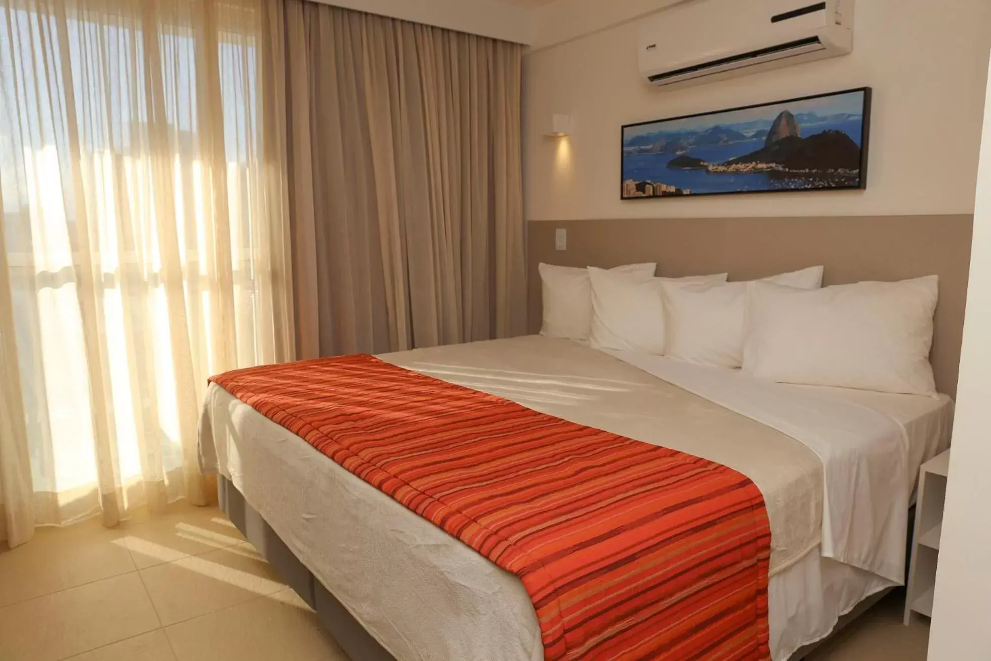 Bed in Ramada by Wyndham Macae Hotel & Suites Bed in Ramada by Wyndham Macae Hotel & Suites