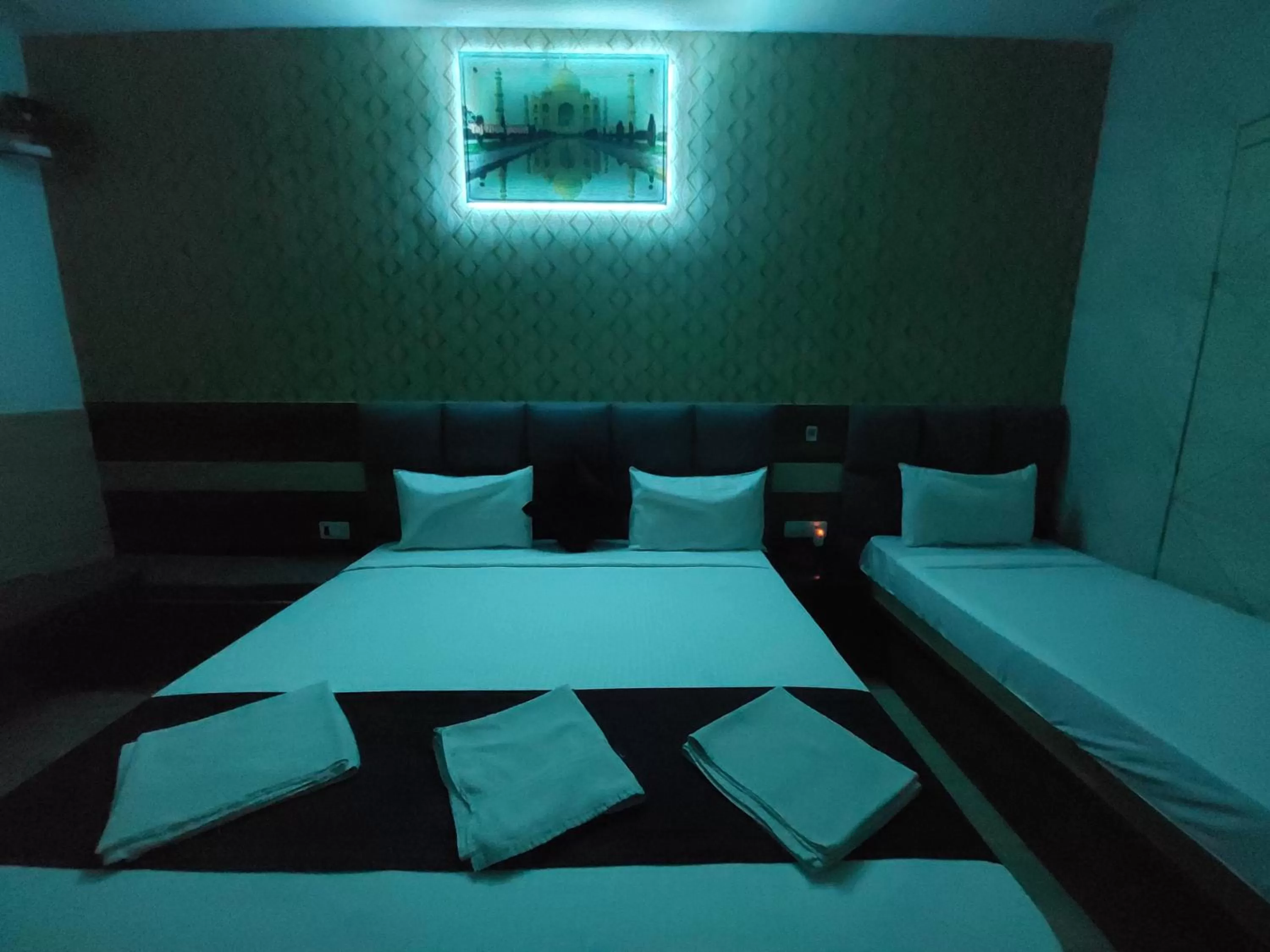 Bed in Taj Nice Point Manage by Taj Sunrise Group