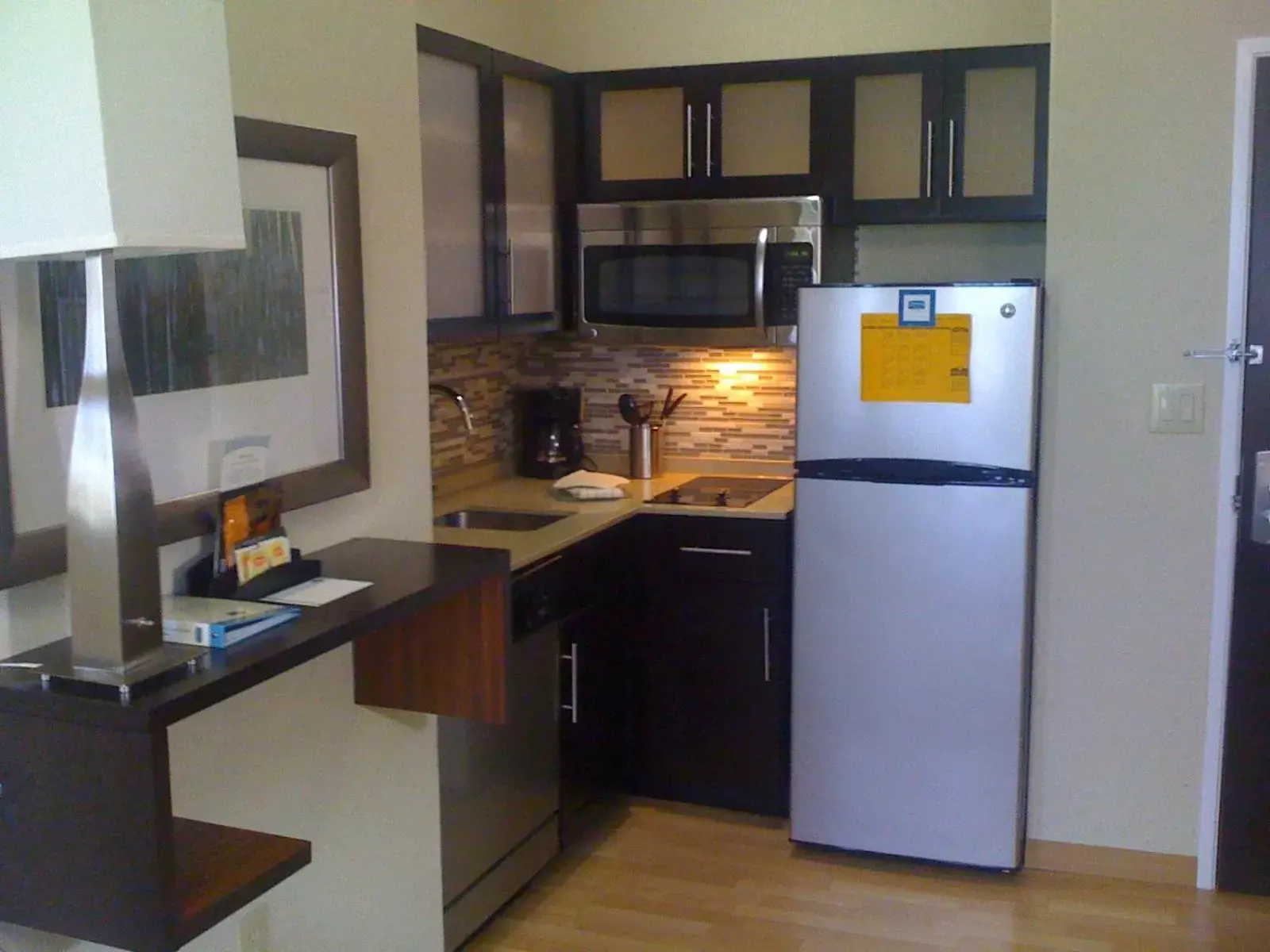 Kitchen or kitchenette, Kitchen/Kitchenette in Staybridge Suites Houston Stafford - Sugar Land, an IHG Hotel