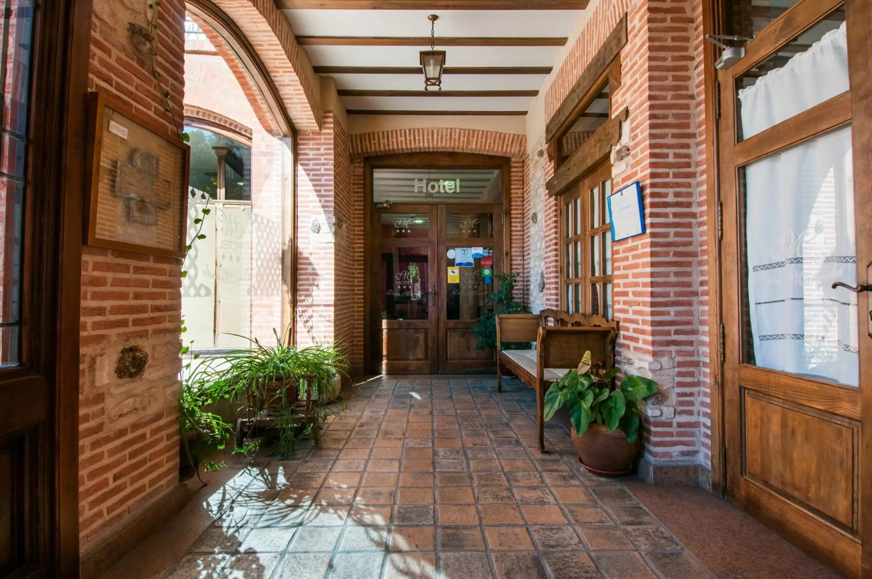 Lobby or reception, Patio/Outdoor Area in Hotel Doña Manuela