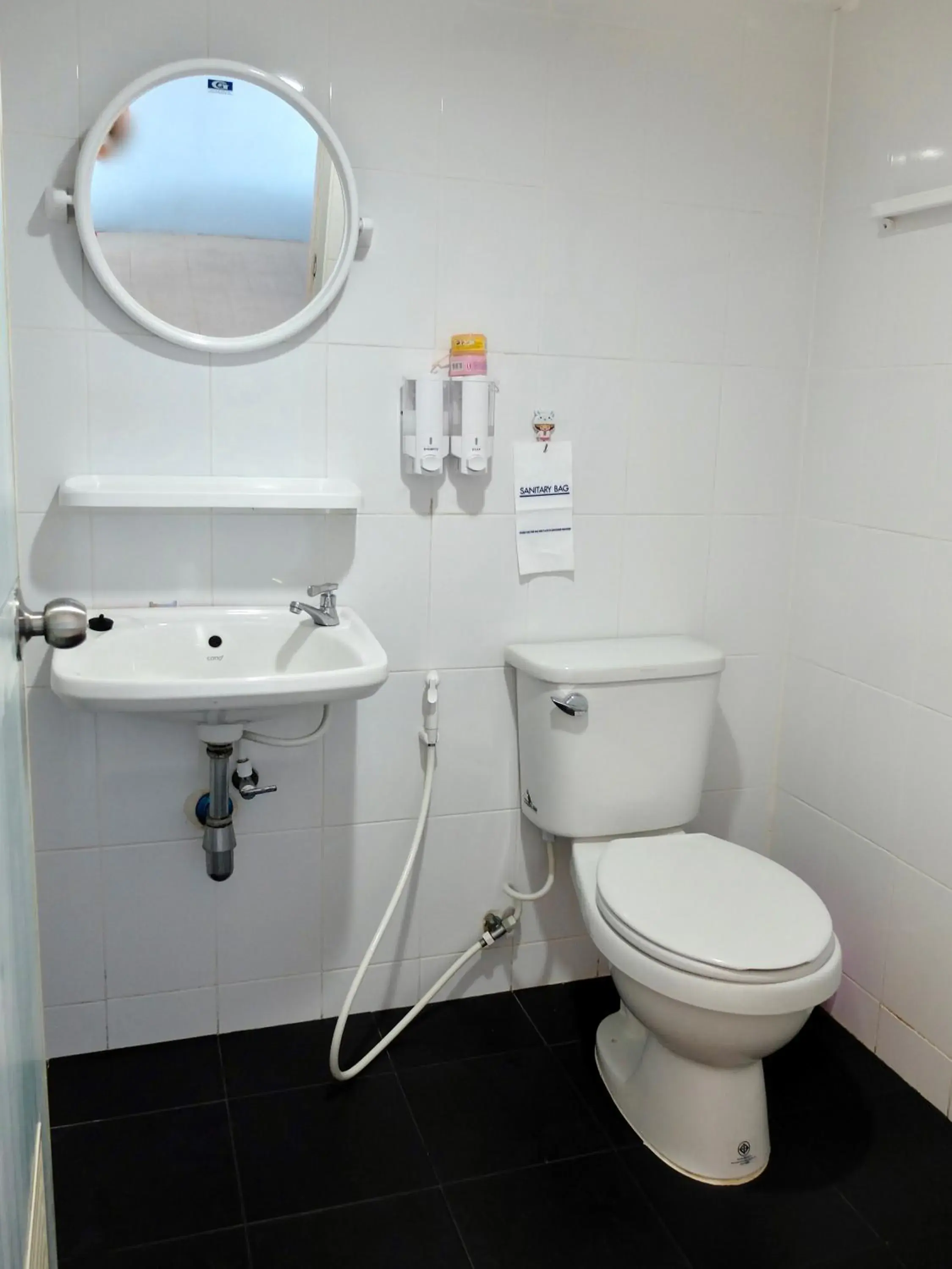 Toilet in We Inn