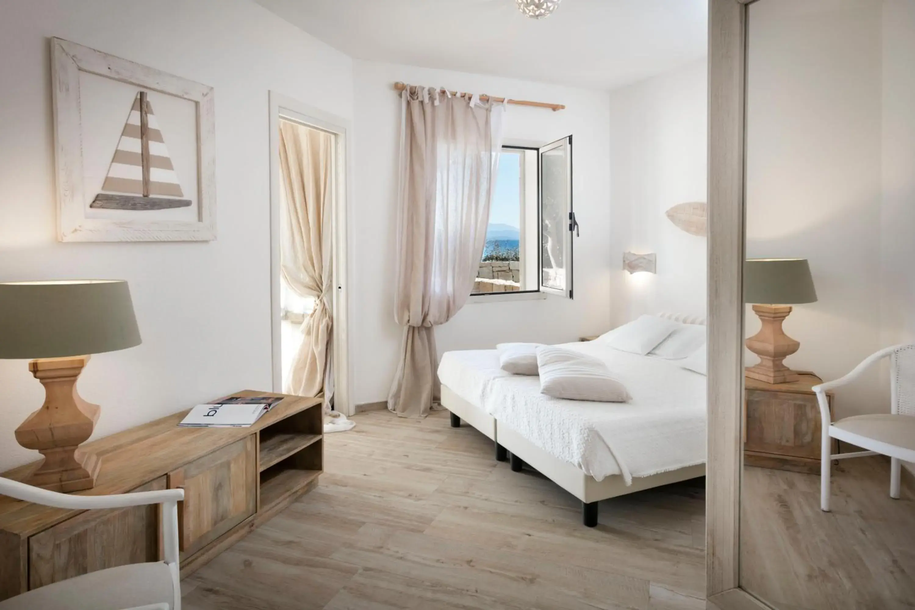 Bed in Gabbiano Azzurro Hotel & Suites