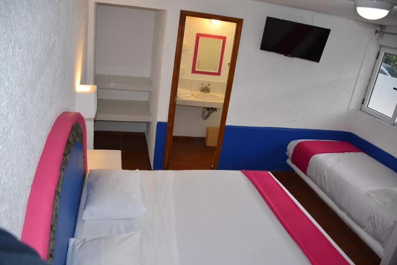 Bed in Hotel Pachuca Inn