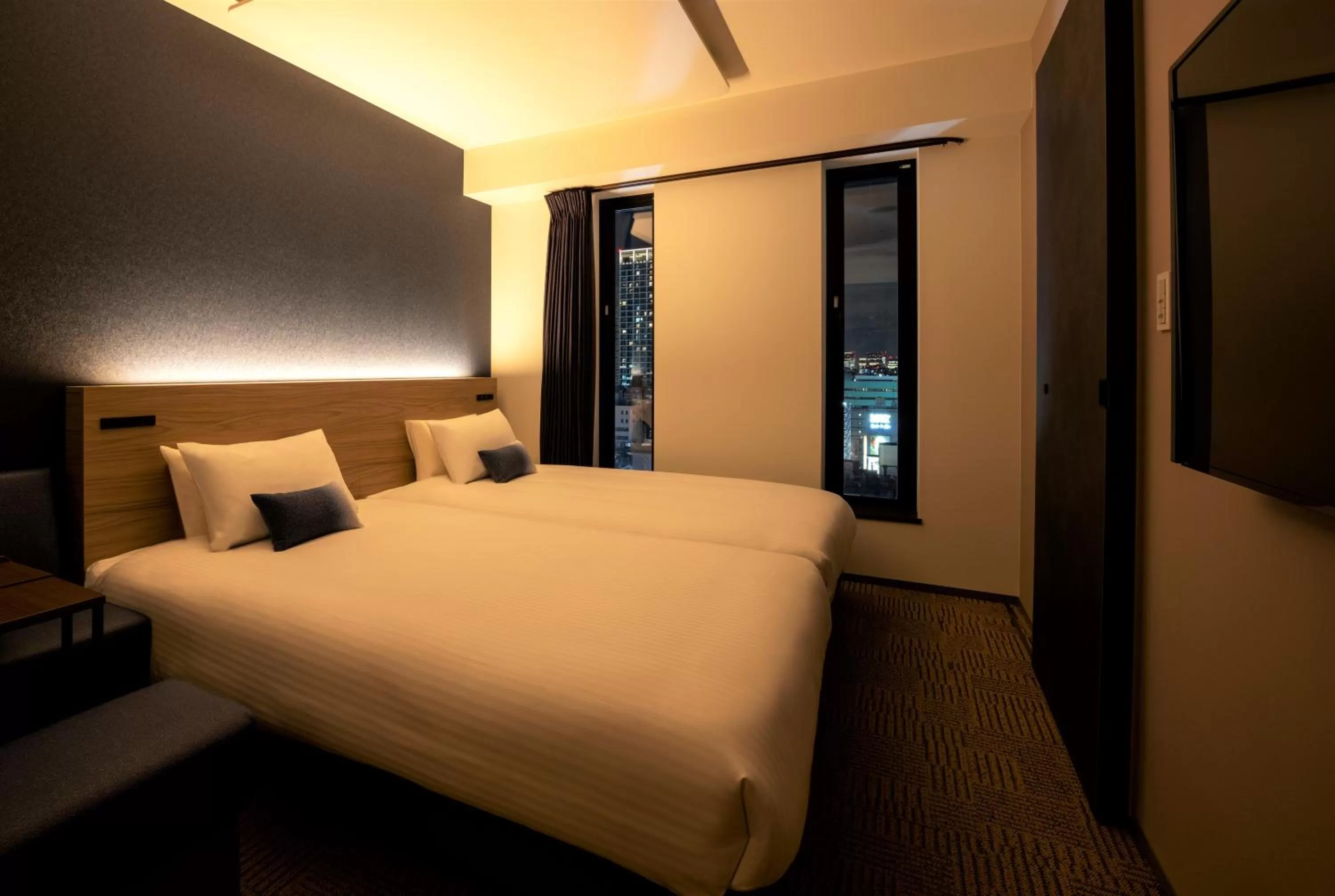 Photo of the whole room, Bed in HOTEL AMANEK Shinjuku Kabukicho