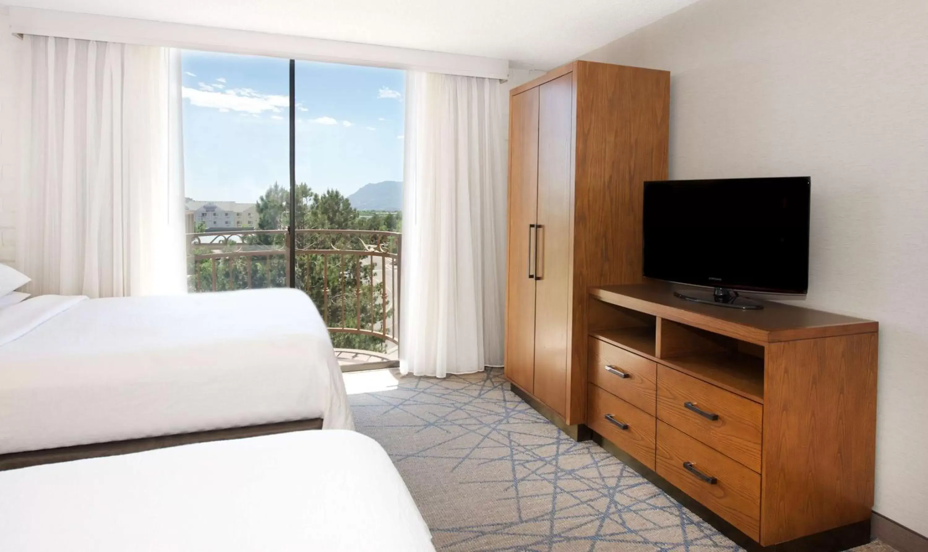 Bed, TV/Entertainment Center in Embassy Suites by Hilton Colorado Springs
