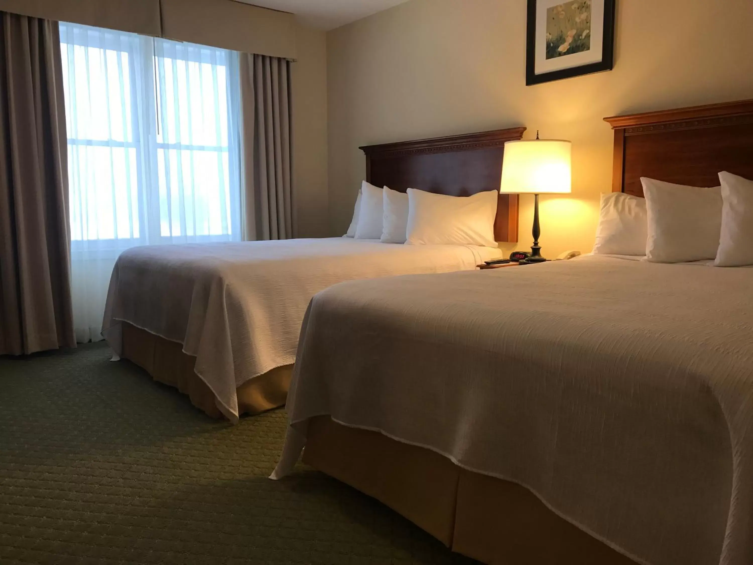 Bed in White River Inn & Suites