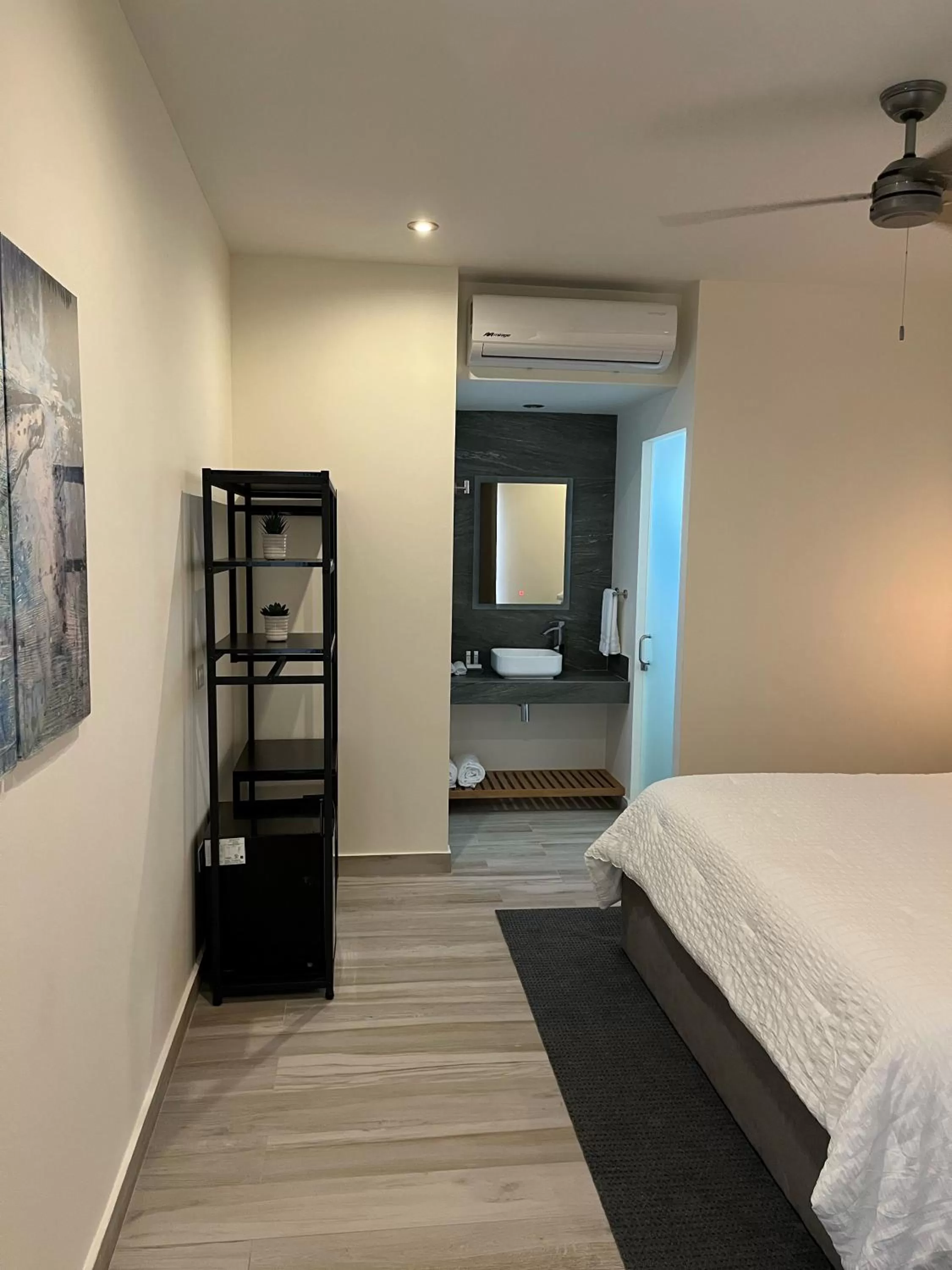 Photo of the whole room, Bed in The Cove Boutique Hotel Adults Only