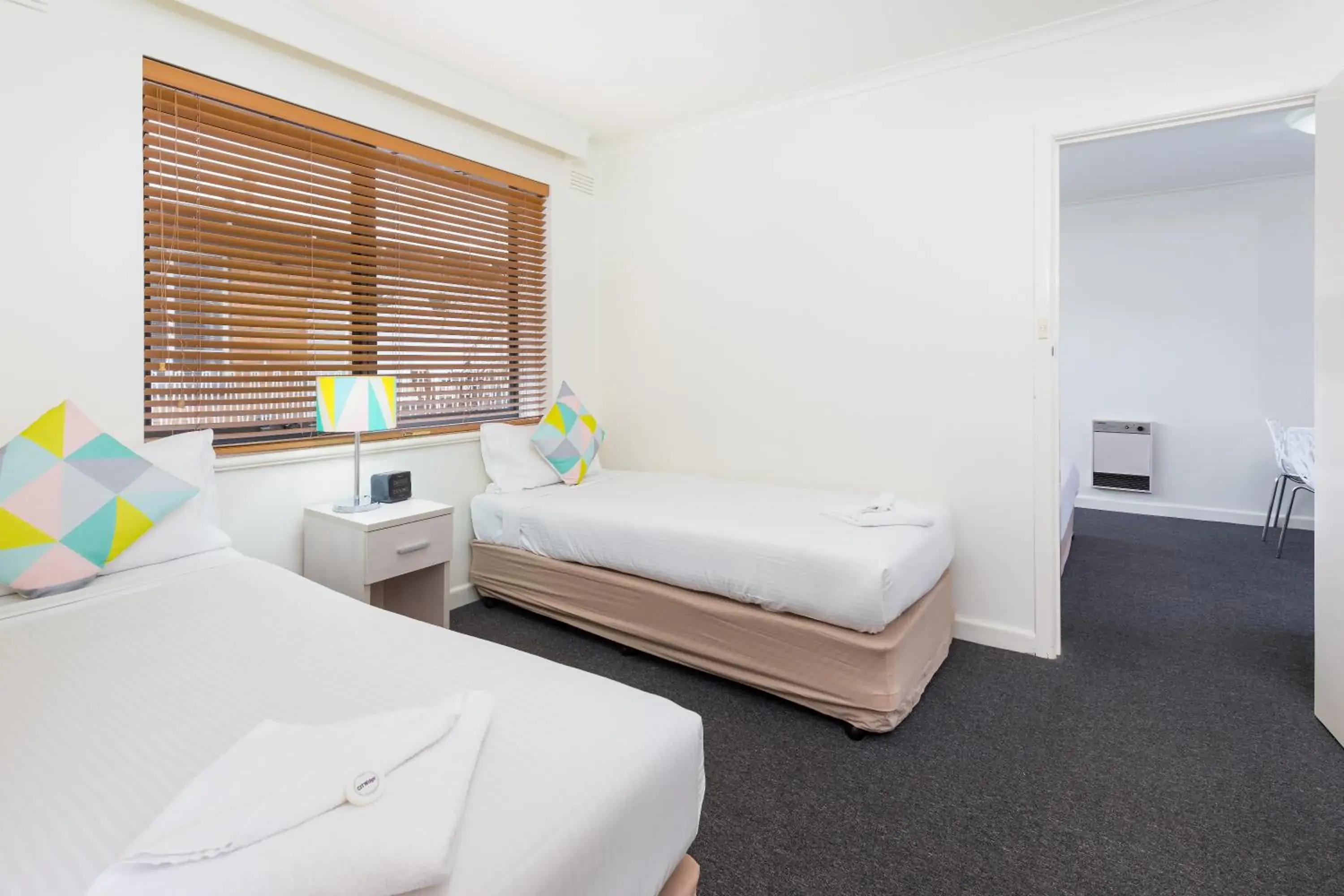 Bedroom, Bed in City Edge East Melbourne Apartment Hotel