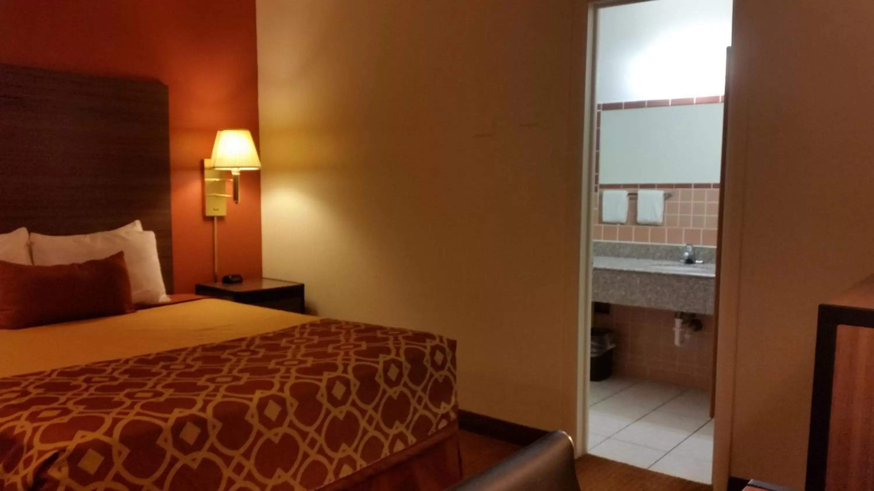 Bed in American Inn Of Liberal Bed in American Inn Of Liberal