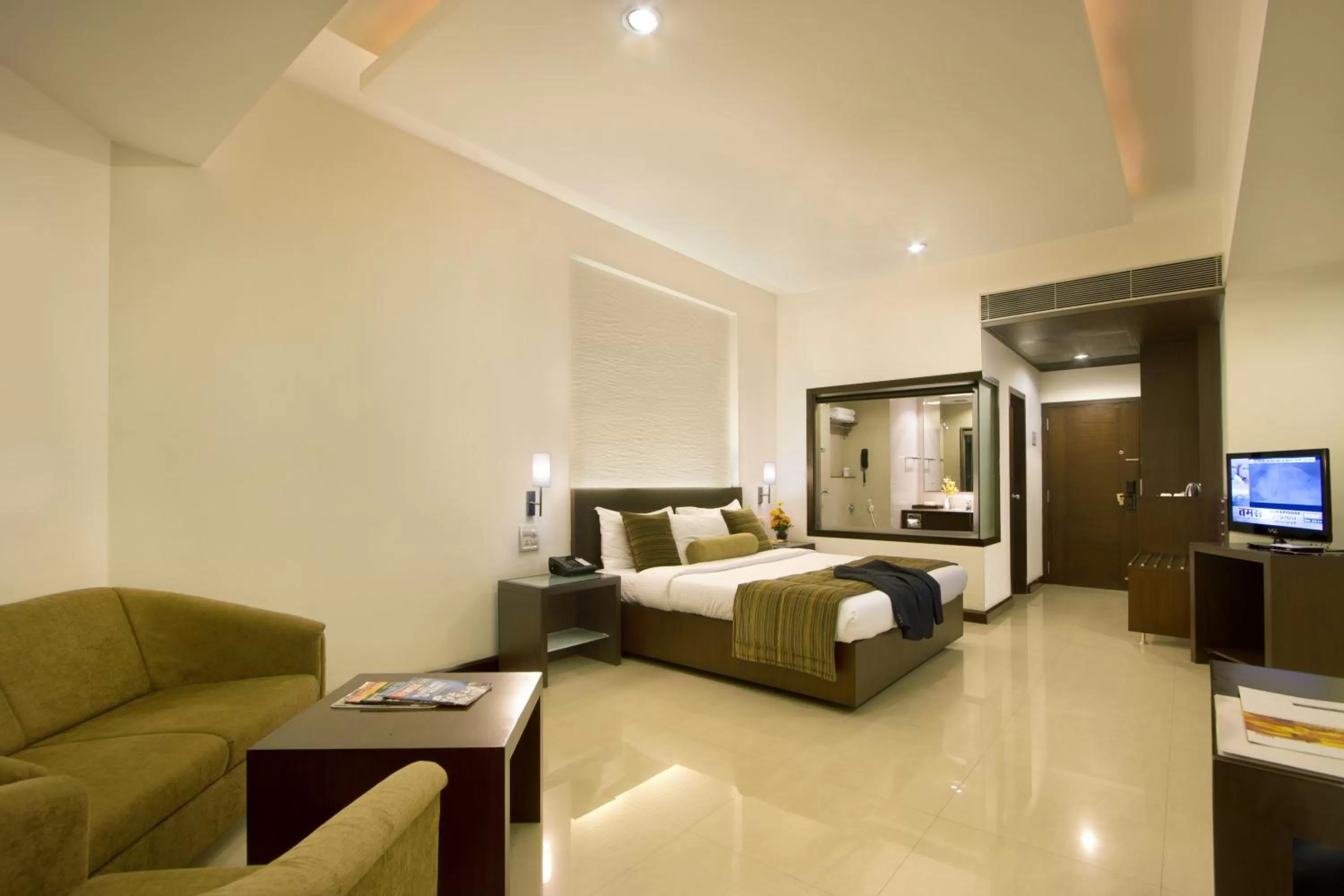 Photo of the whole room, Bed in Hotel Express Residency Vadodara