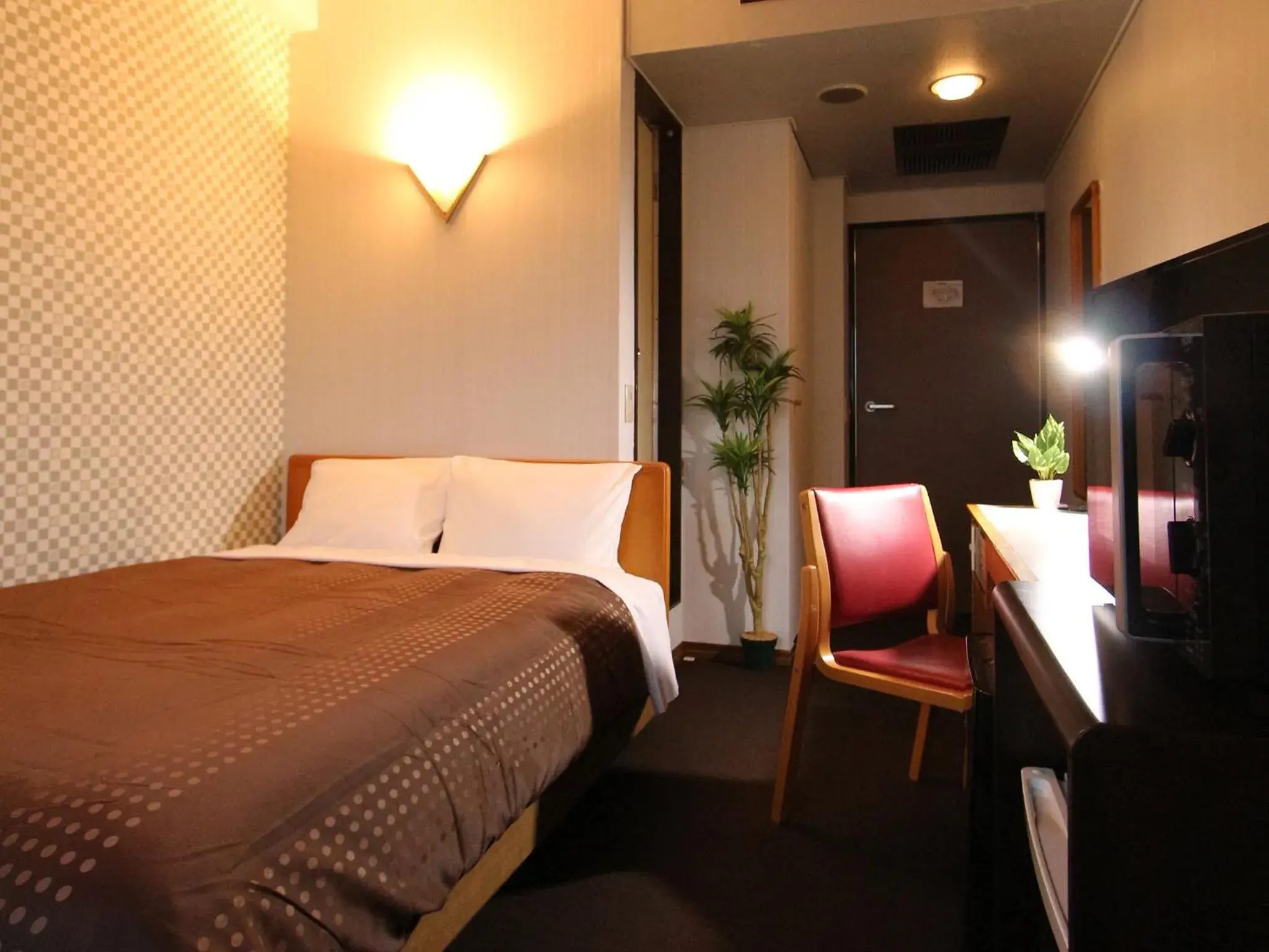 Bed in HOTEL LiVEMAX BUDGET Utsunomiya