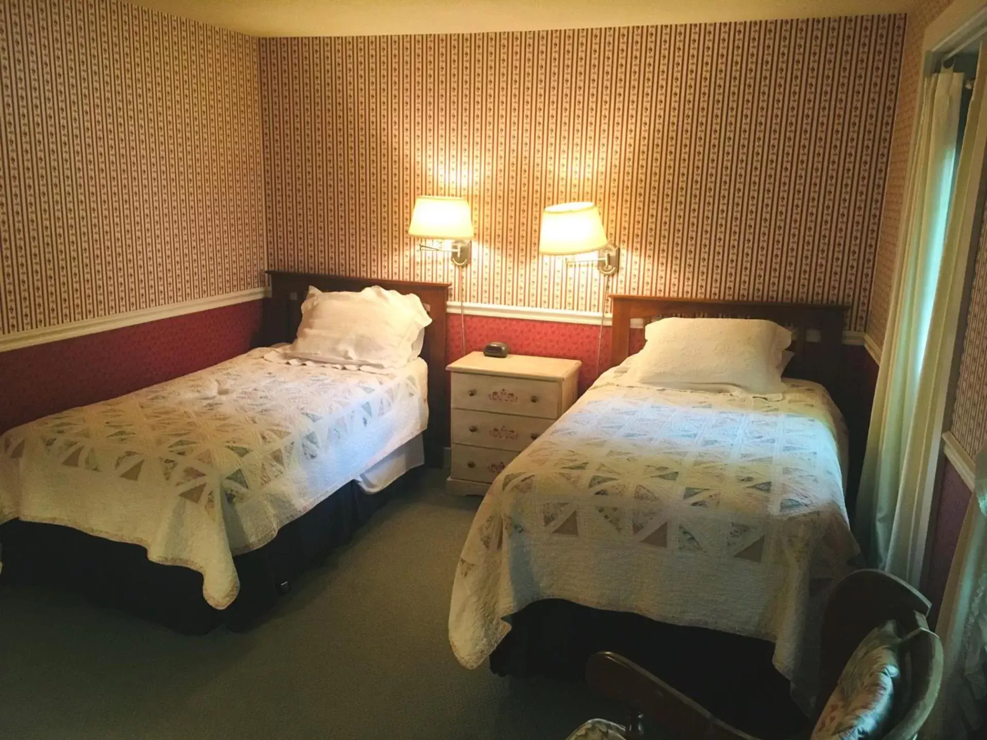 Bed in Carriage Barn Inn
