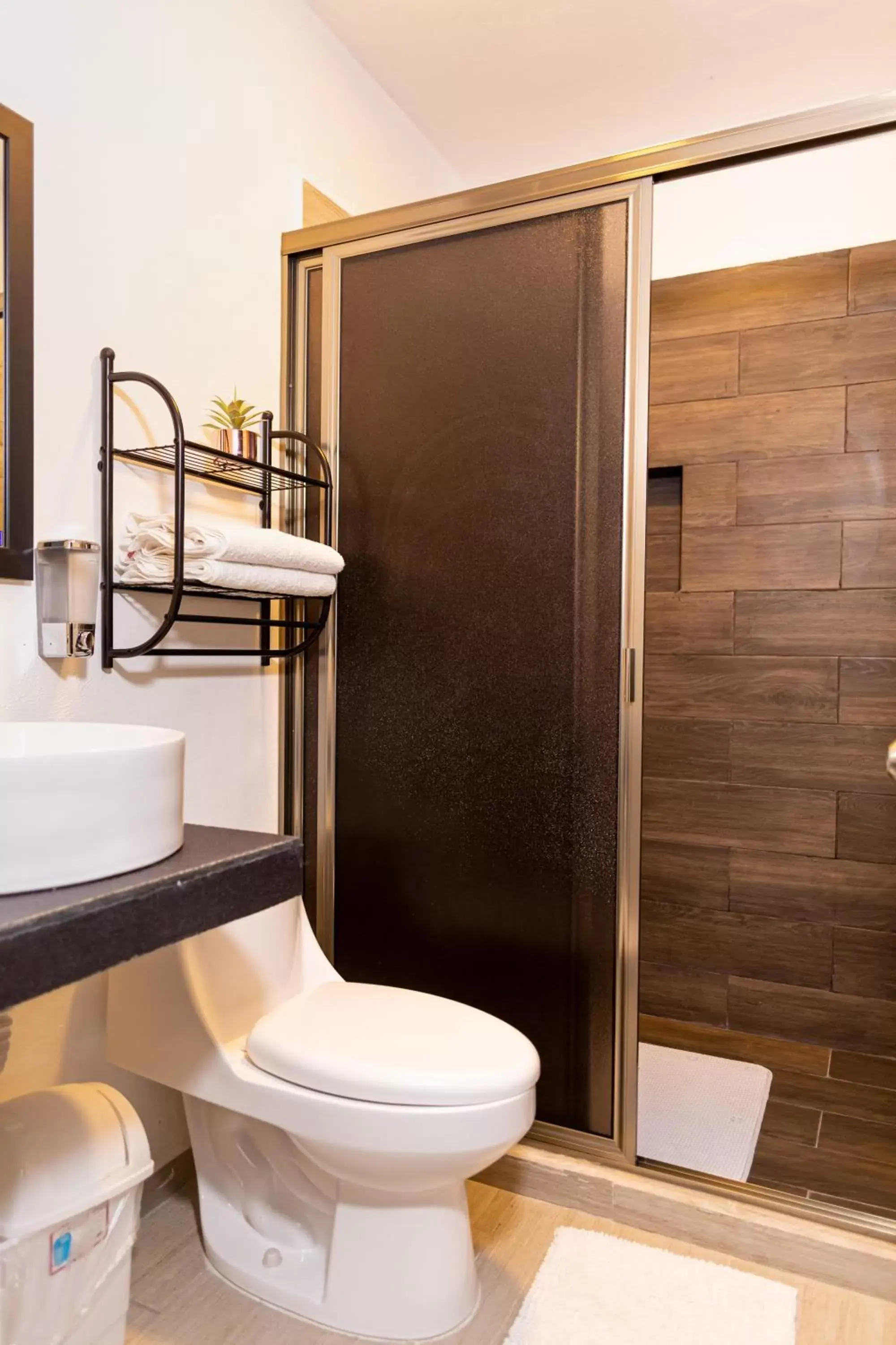 Bathroom in Santa Fe Studios And Suites