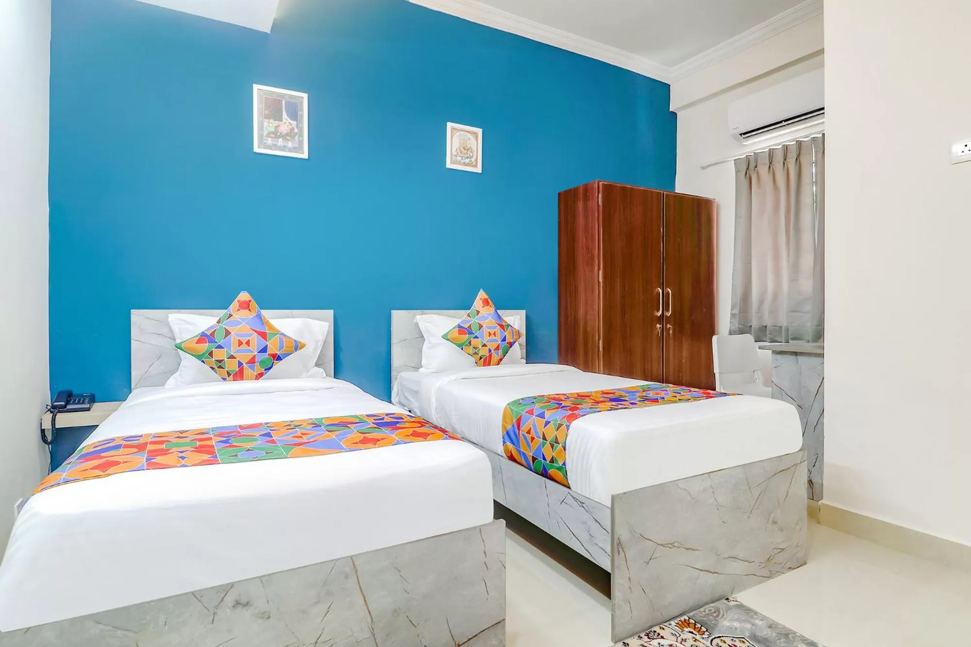 Bed in FabHotel Broholic Suites - Nr US Consulate, Financial District