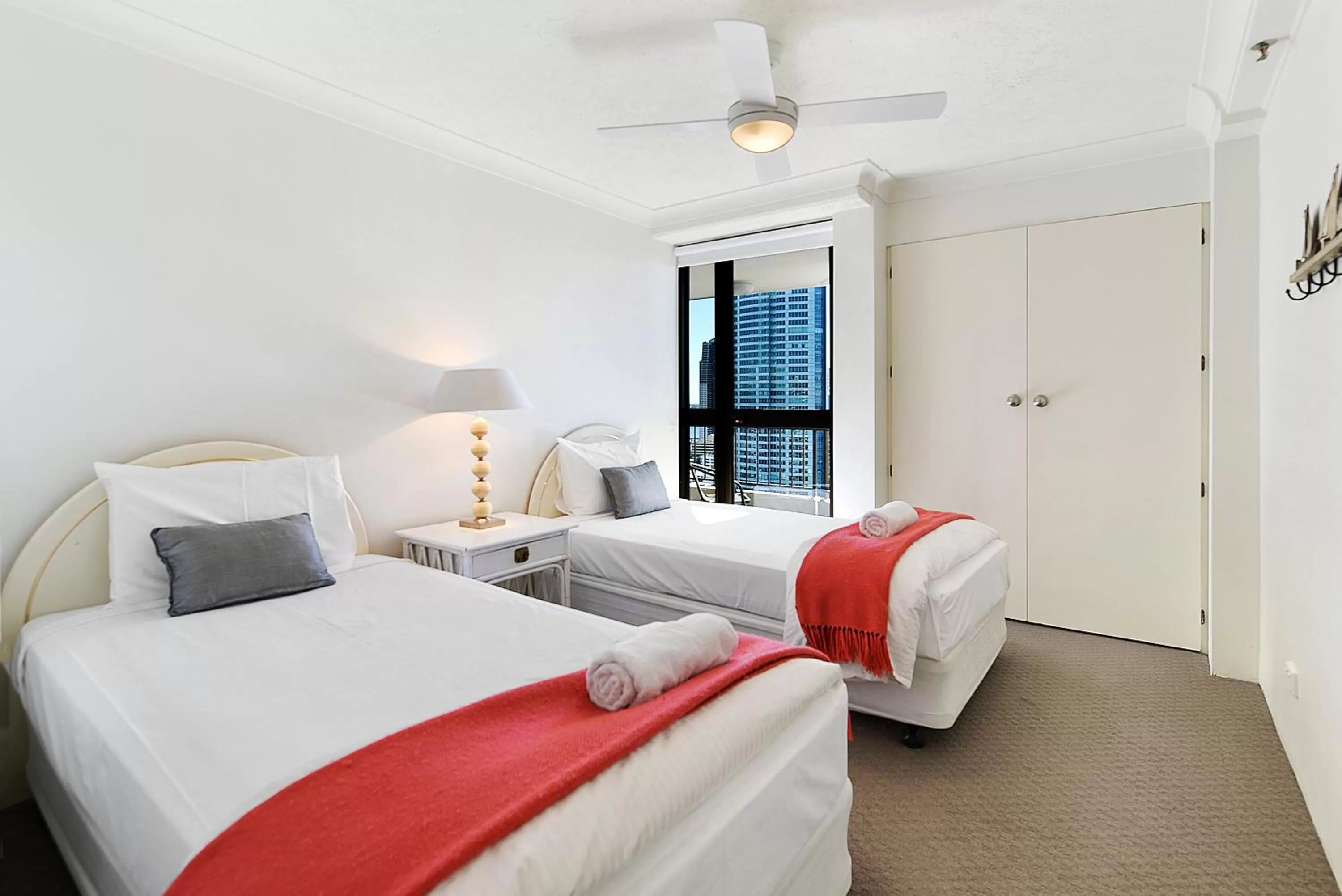 Bedroom, Bed in Surfers Century Oceanside Apartments