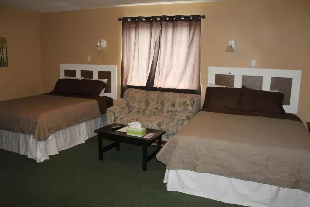 Bed in Country Inn Hotel