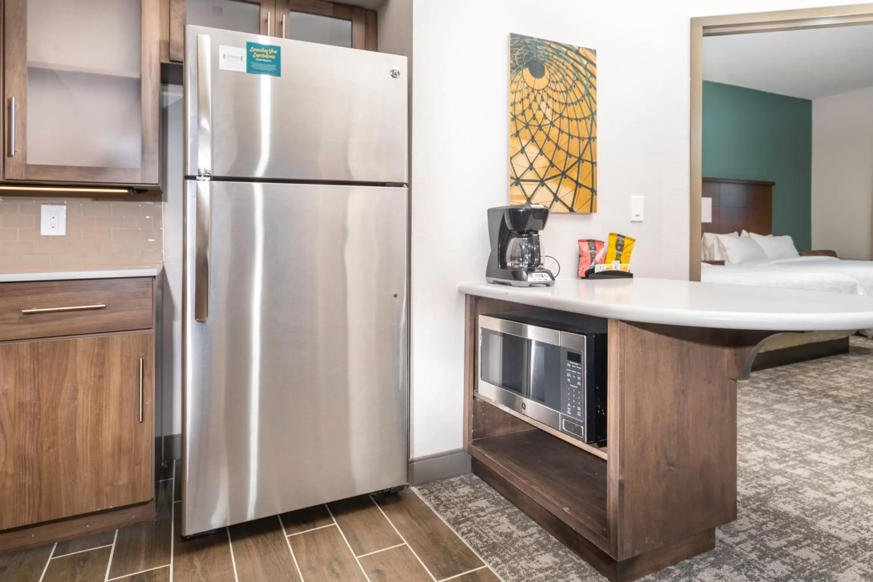 Photo of the whole room, Kitchen/Kitchenette in Staybridge Suites Florence - Cincinnati South, an IHG Hotel