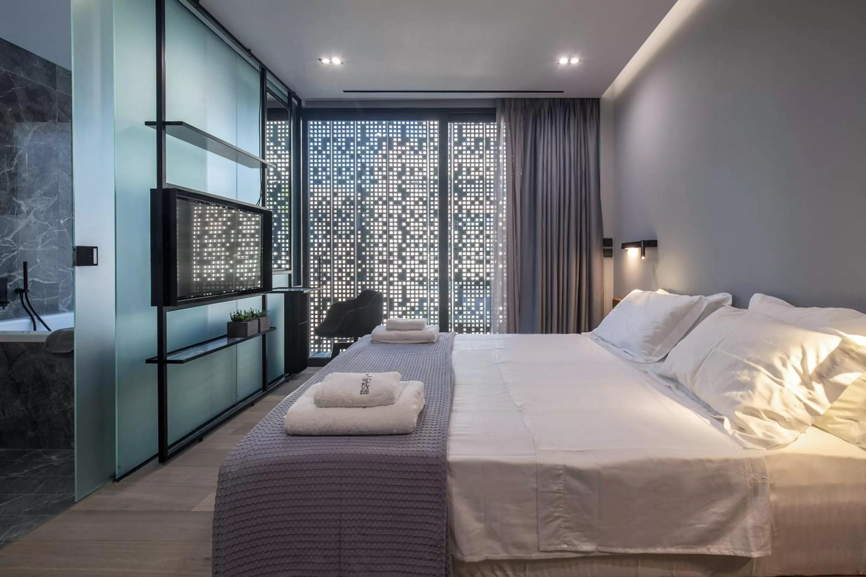 Bed in The Duke Boutique Suites