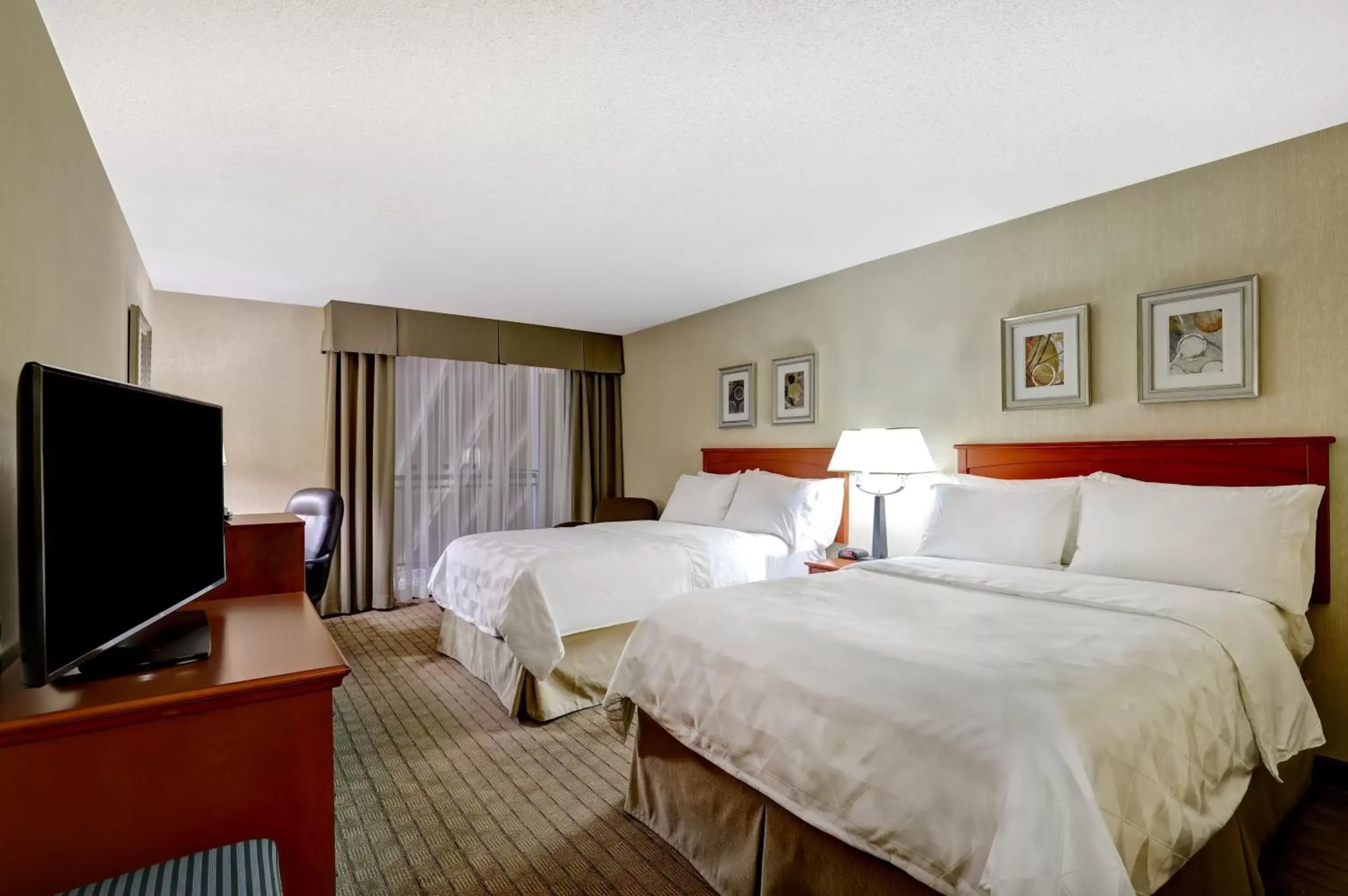 Photo of the whole room, Bed in Holiday Inn Laval Montreal, an IHG Hotel