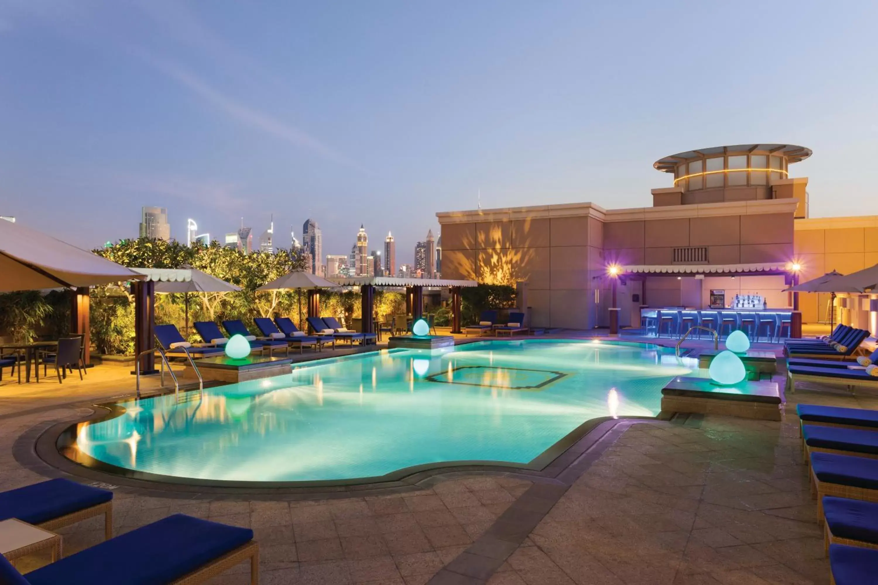 Property building, Swimming Pool in Crowne Plaza - Dubai Jumeirah, an IHG Hotel