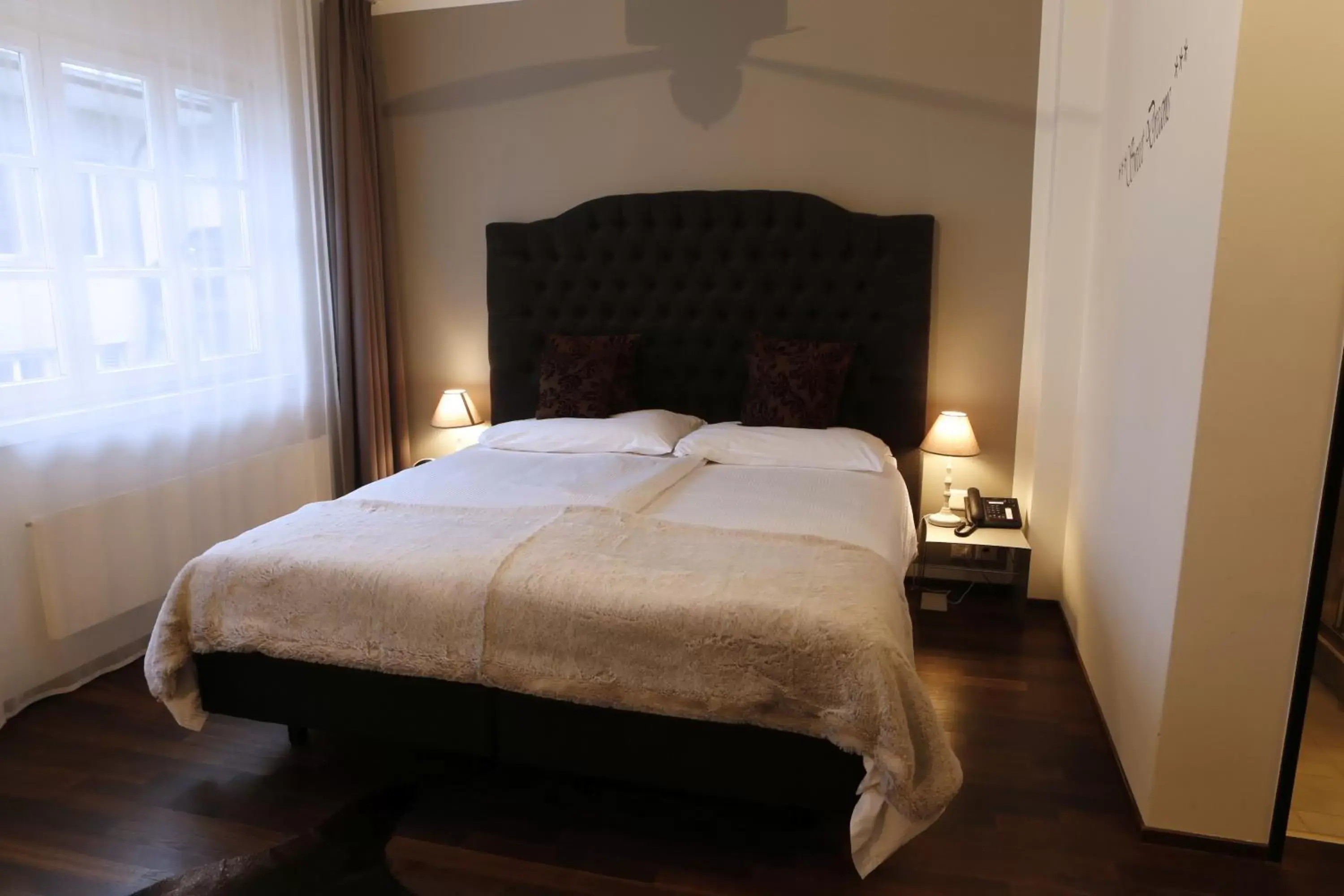 Bedroom, Bed in Boutique Hotel Weisses Kreuz - Adult only Hotel