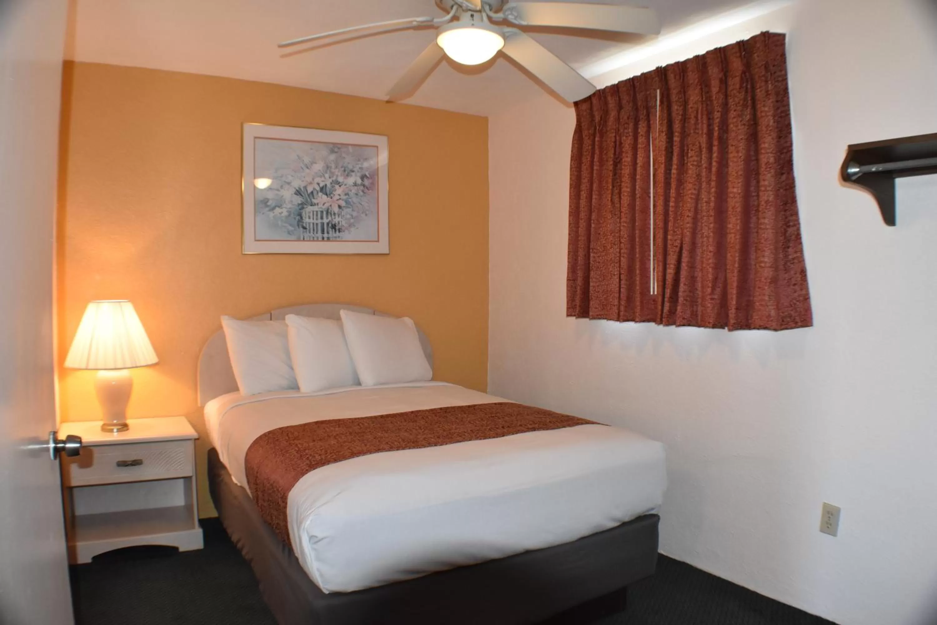 Bed in Blue Water Motel