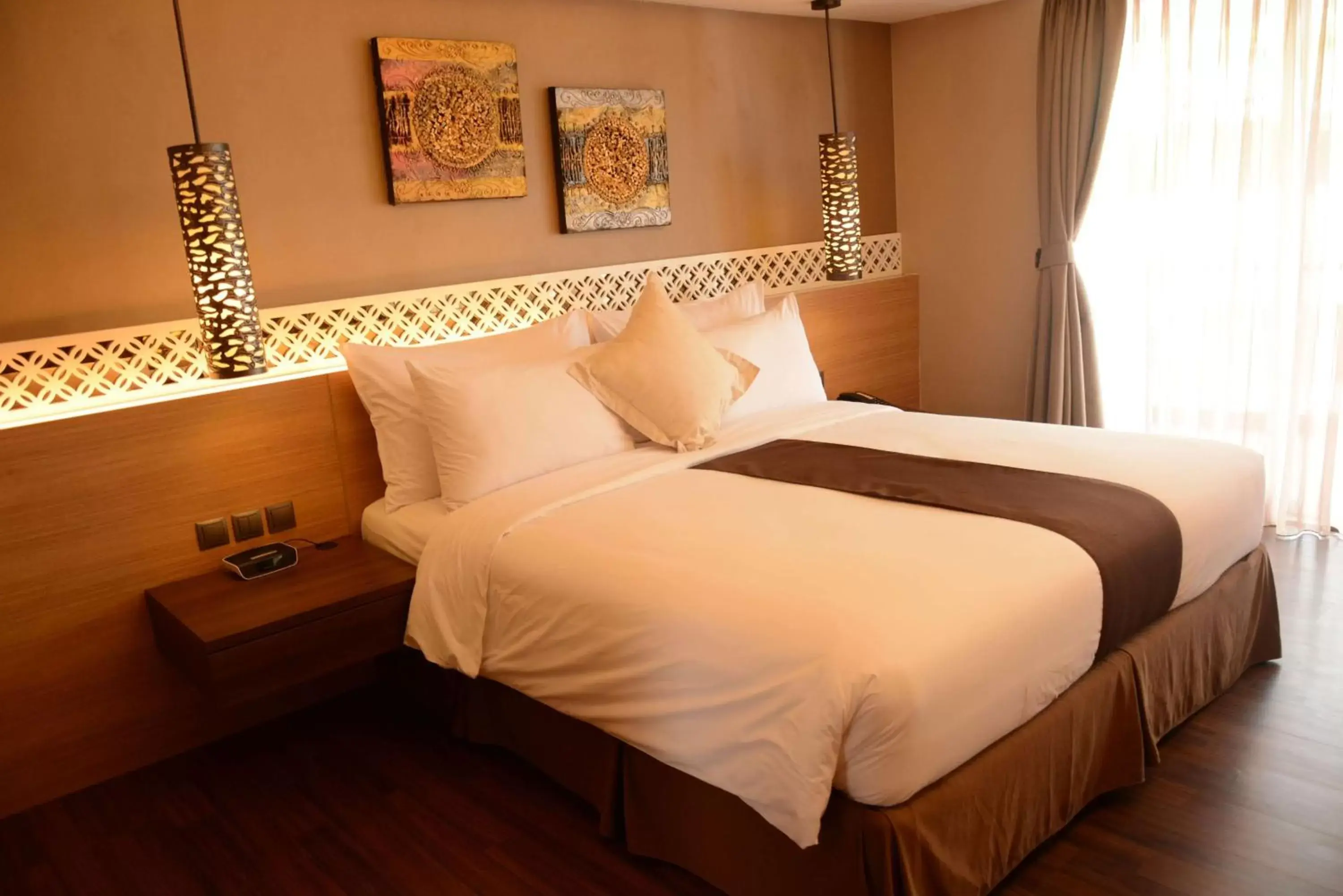 Photo of the whole room, Bed in Ramada by Wyndham Bali Sunset Road Kuta