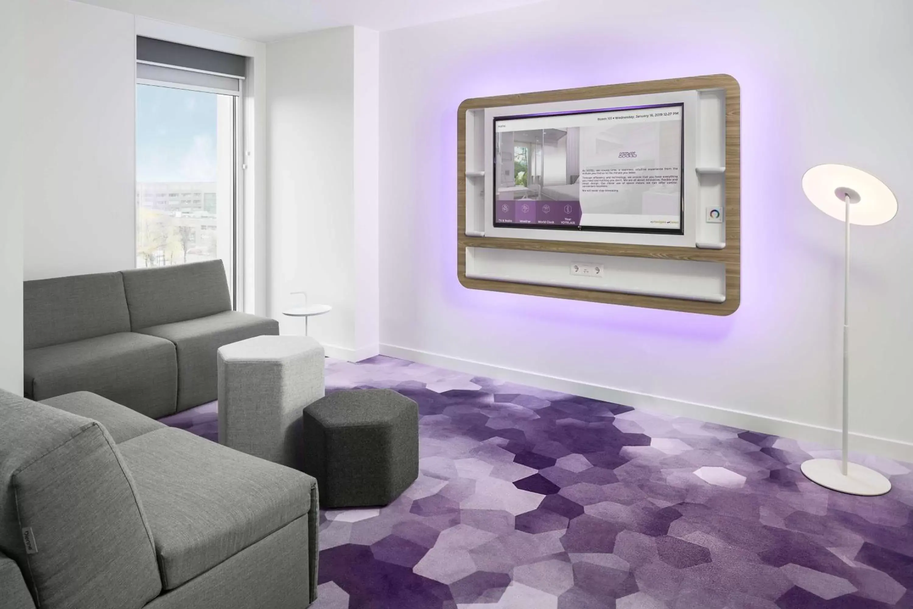 Photo of the whole room, Seating Area in YOTEL Amsterdam