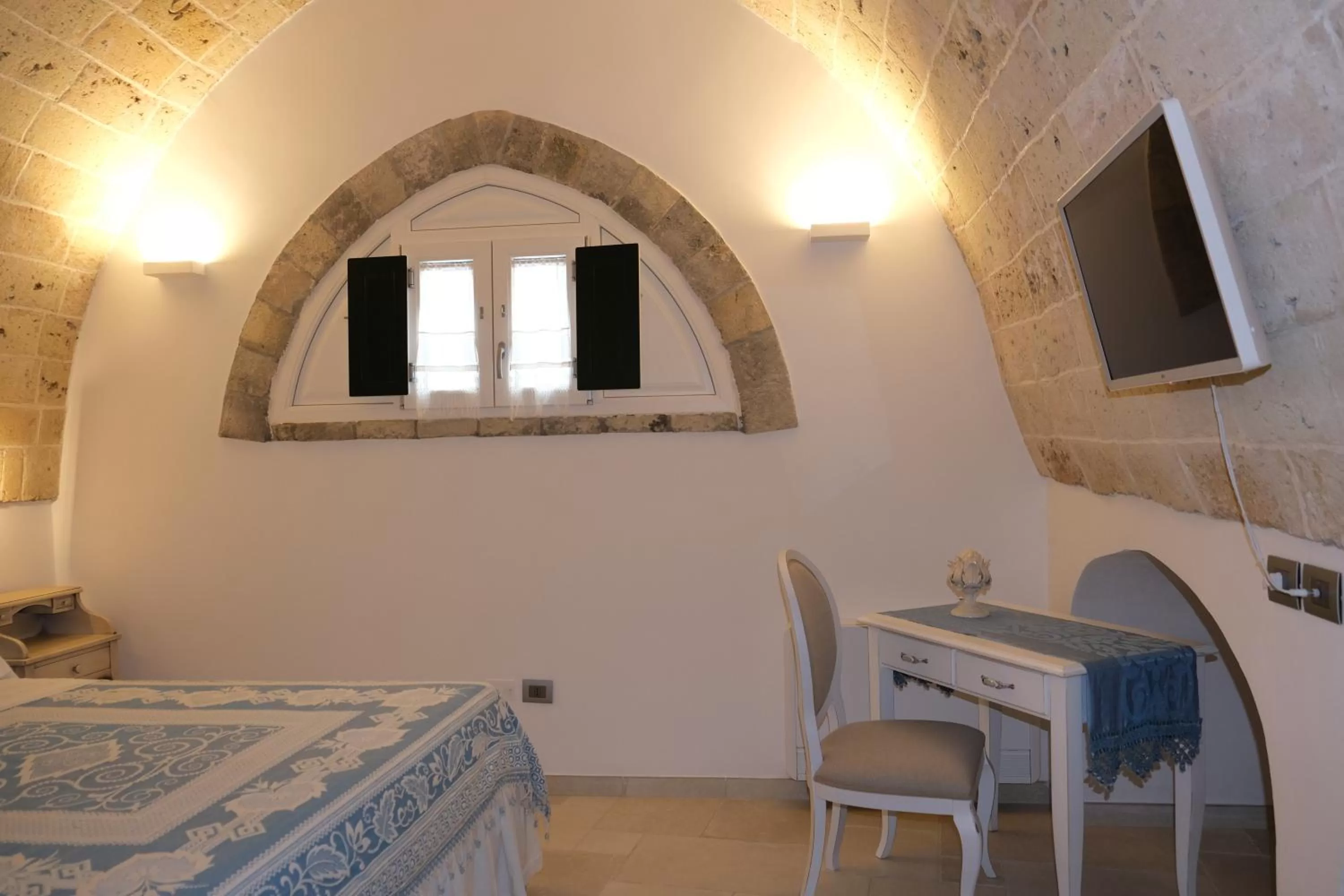 Bed in PLAZACARRISI HOTEL & SPA