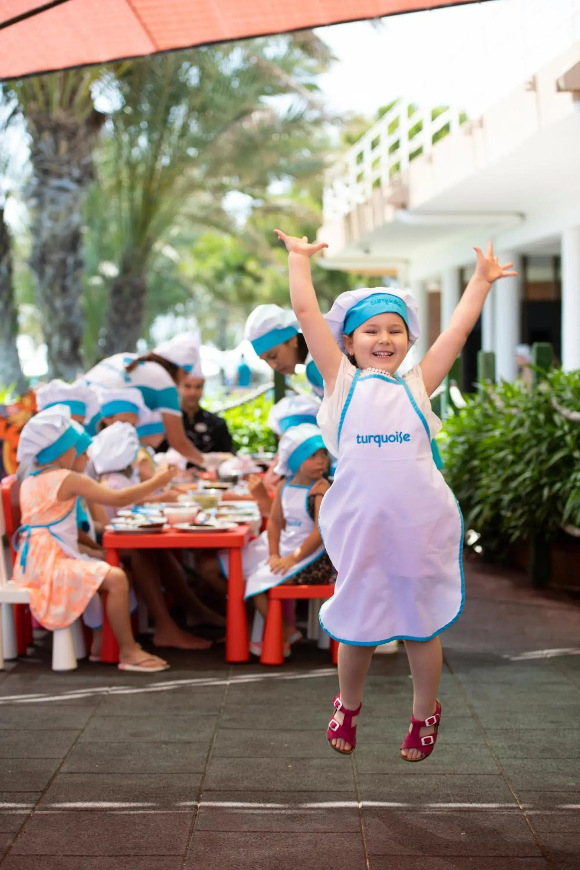 children in Turquoise Hotel