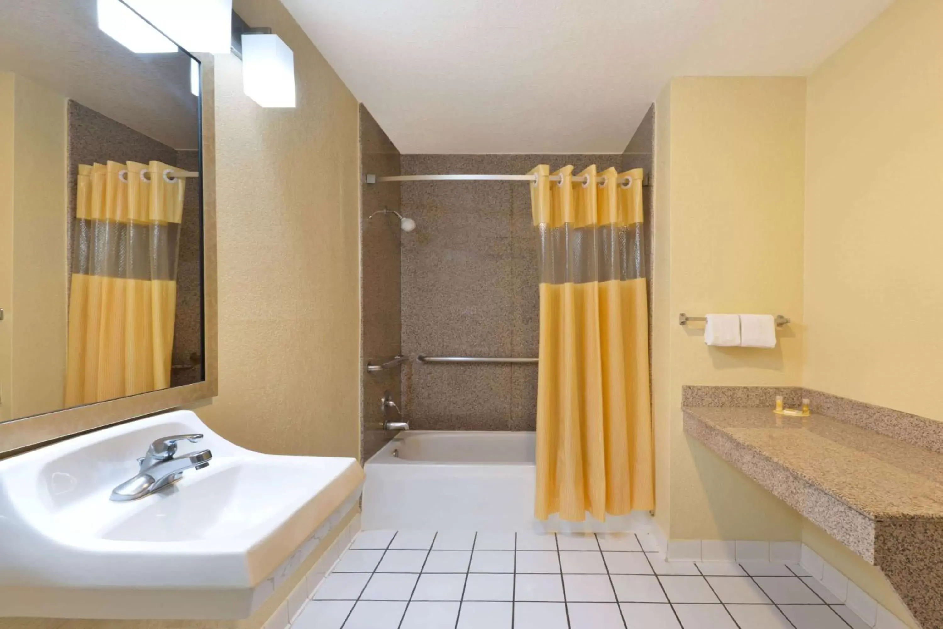 Bathroom in Days Inn by Wyndham San Antonio Northwest/Seaworld