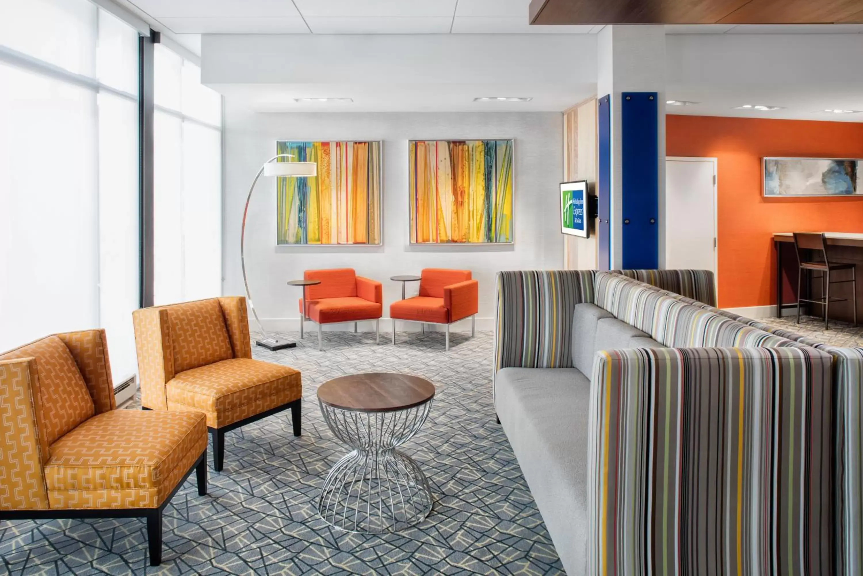 Property building, Seating Area in Holiday Inn Express East Peoria - Riverfront, an IHG Hotel
