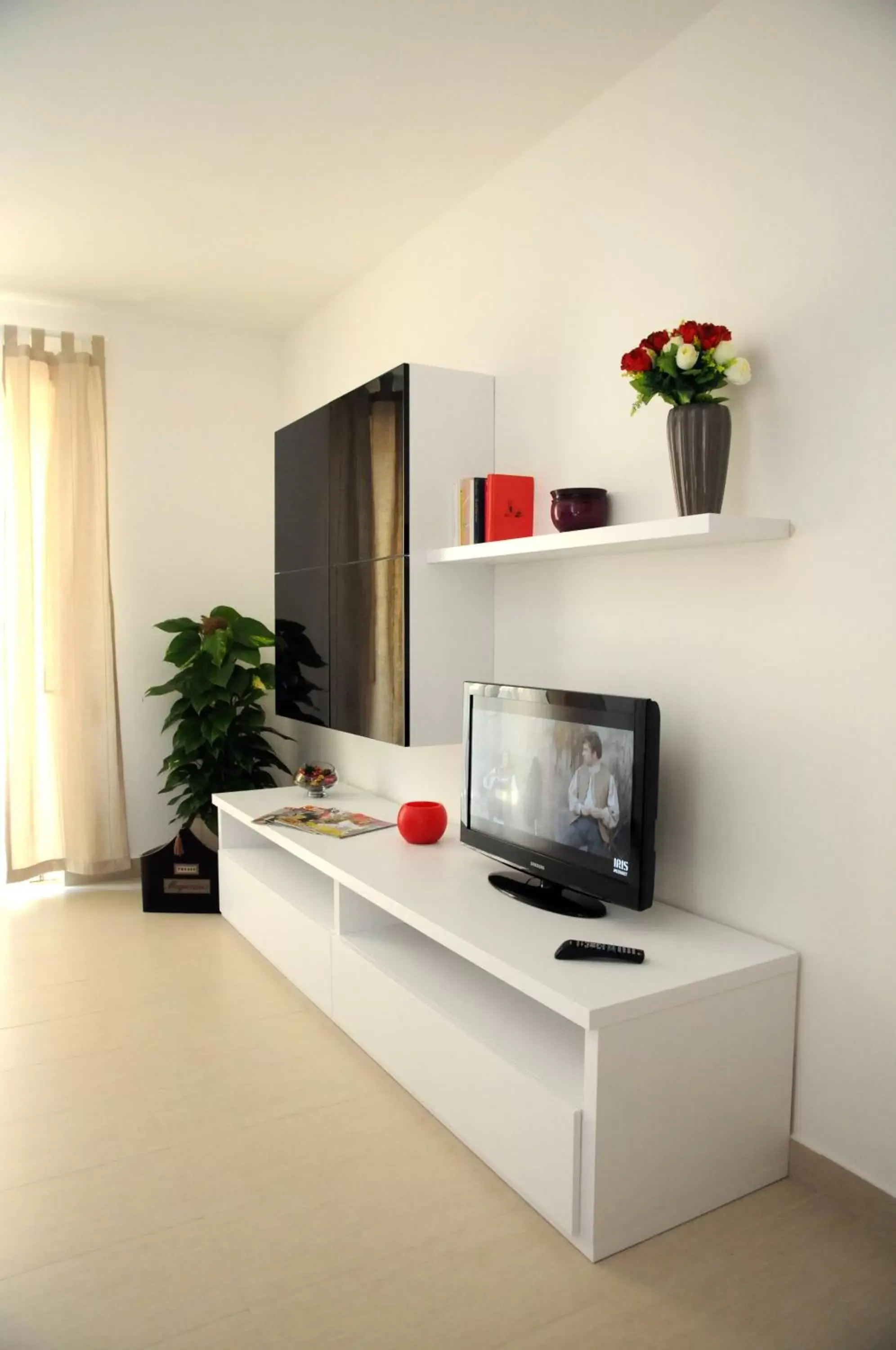 TV and multimedia, TV/Entertainment Center in Isa Residence Fiumicino Airport