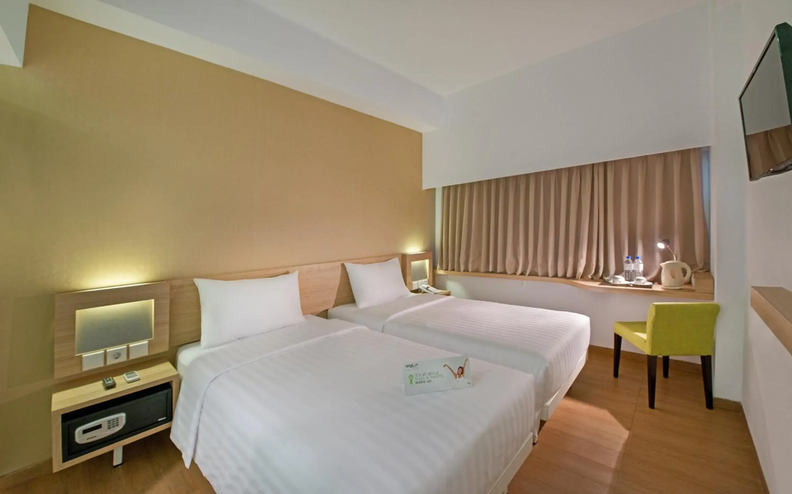 Bed in Whiz Prime Hotel Megamas Manado