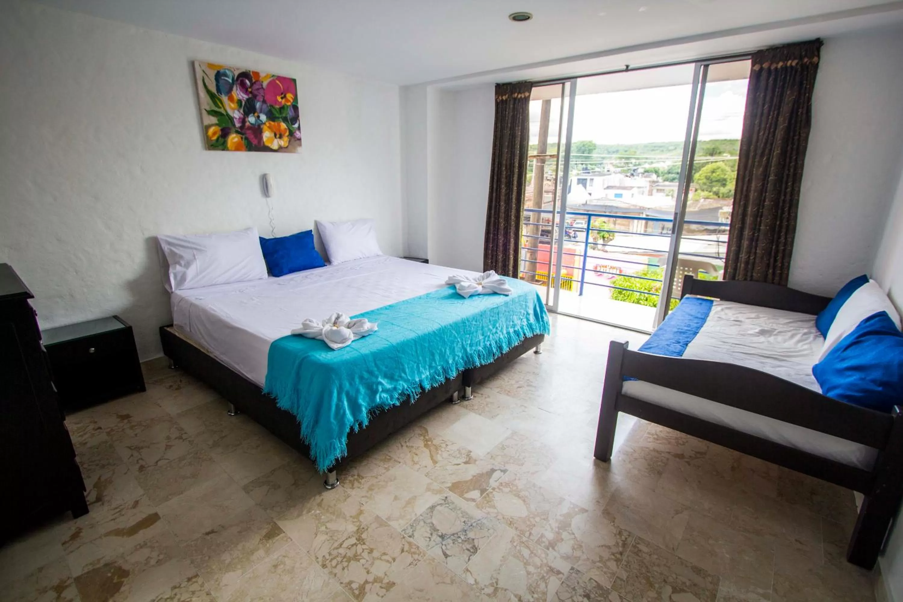 Bed in Blue Star Hotel