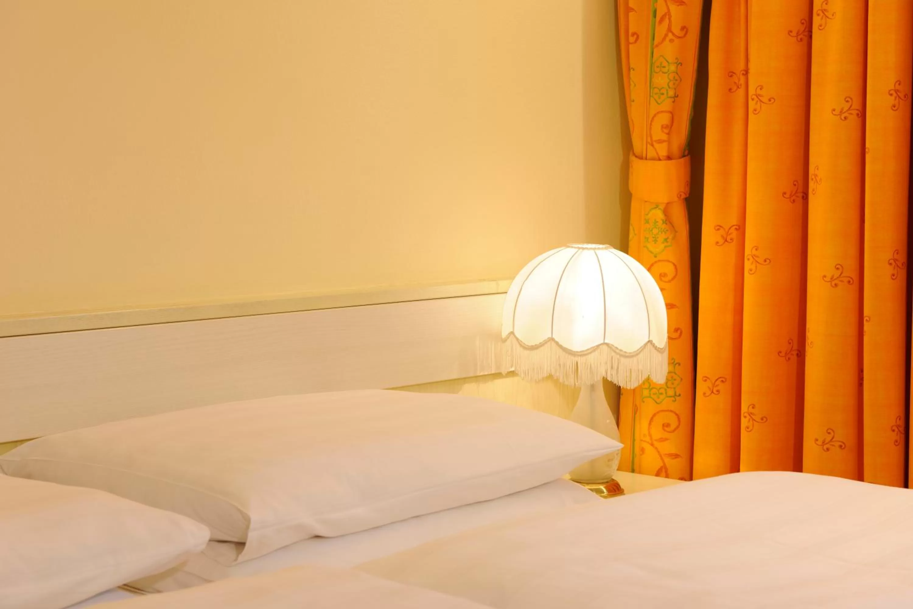 Bed in Hotel Scherer