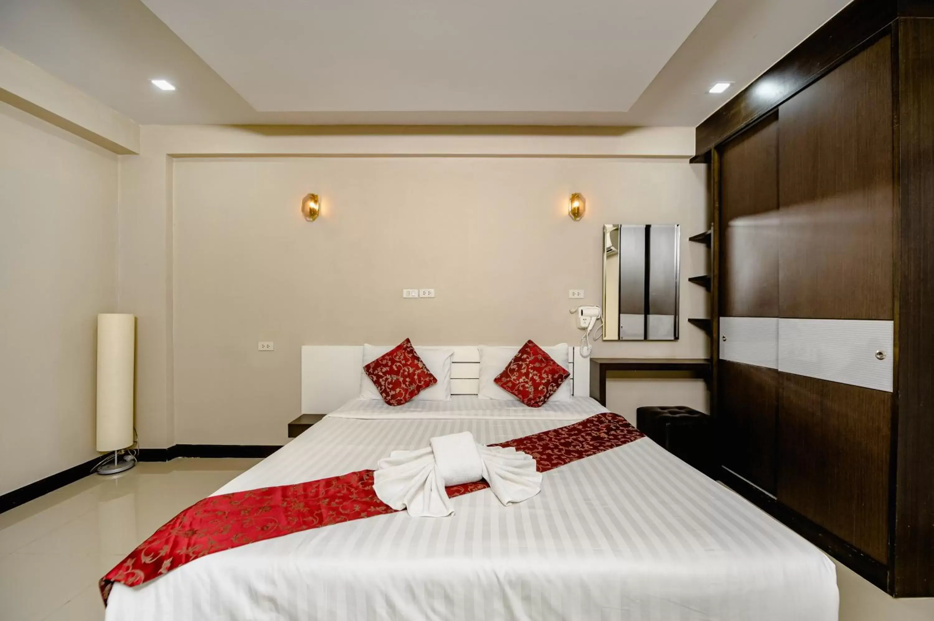 Bed in Gold Airport Suites