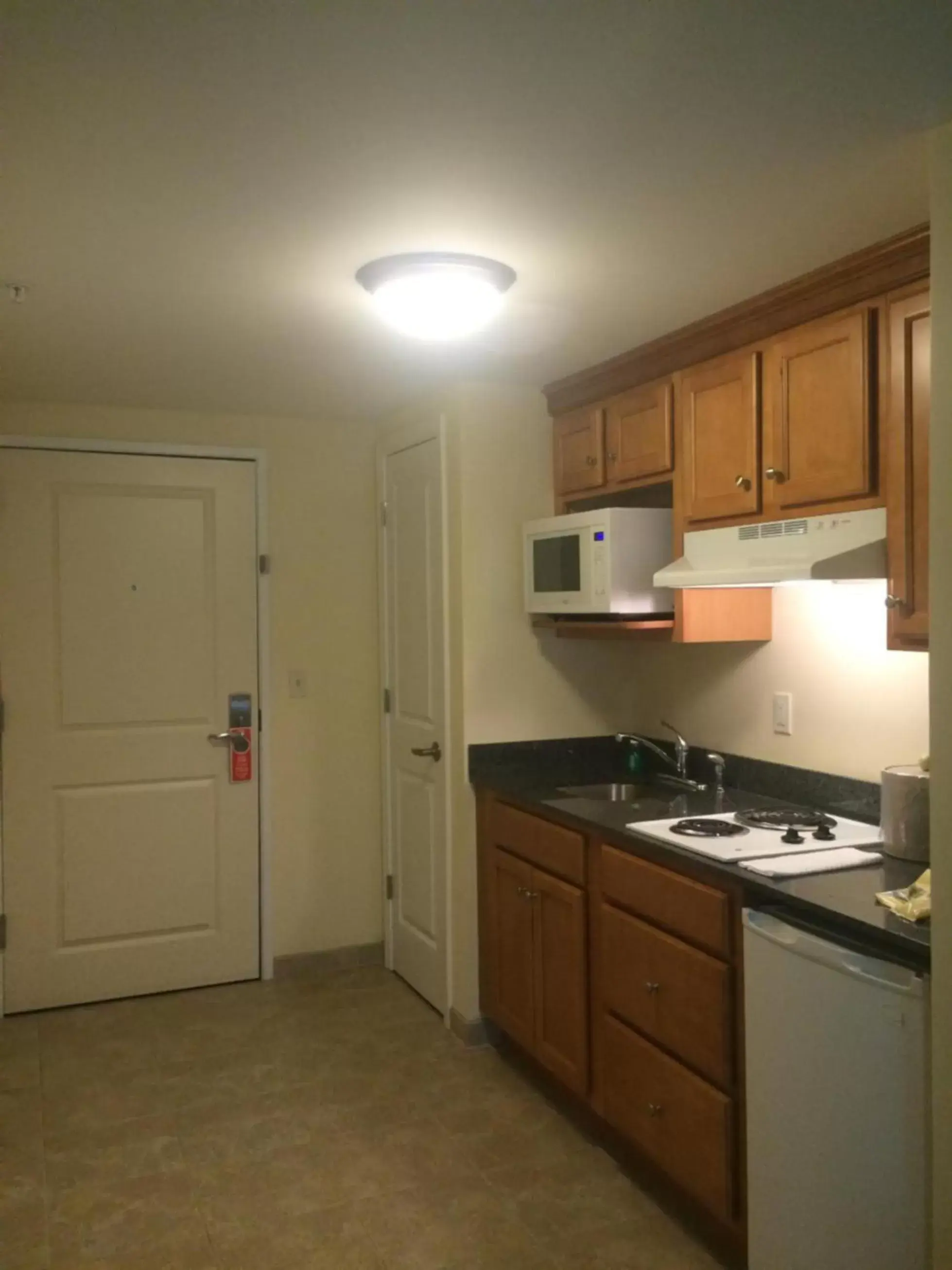 Kitchen or kitchenette, Kitchen/Kitchenette in White River Inn & Suites