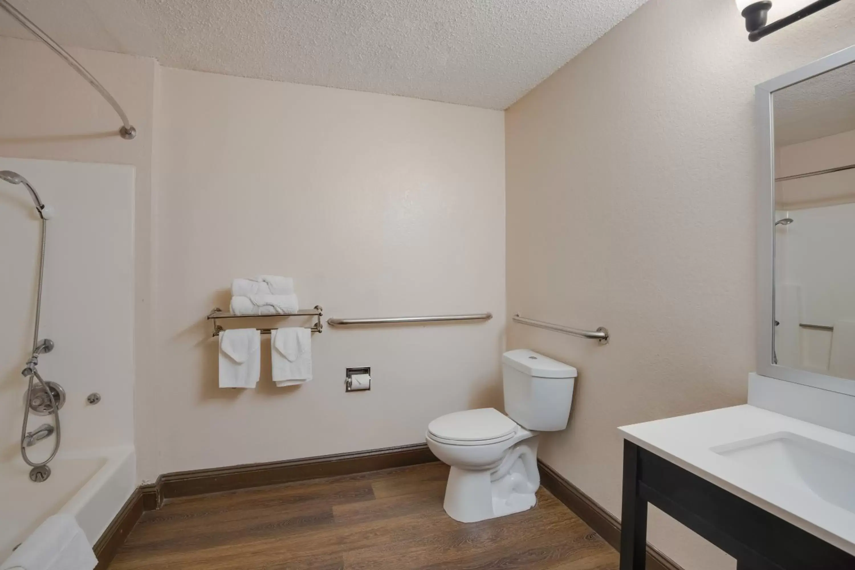 Toilet, Bathroom in Rodeway Inn