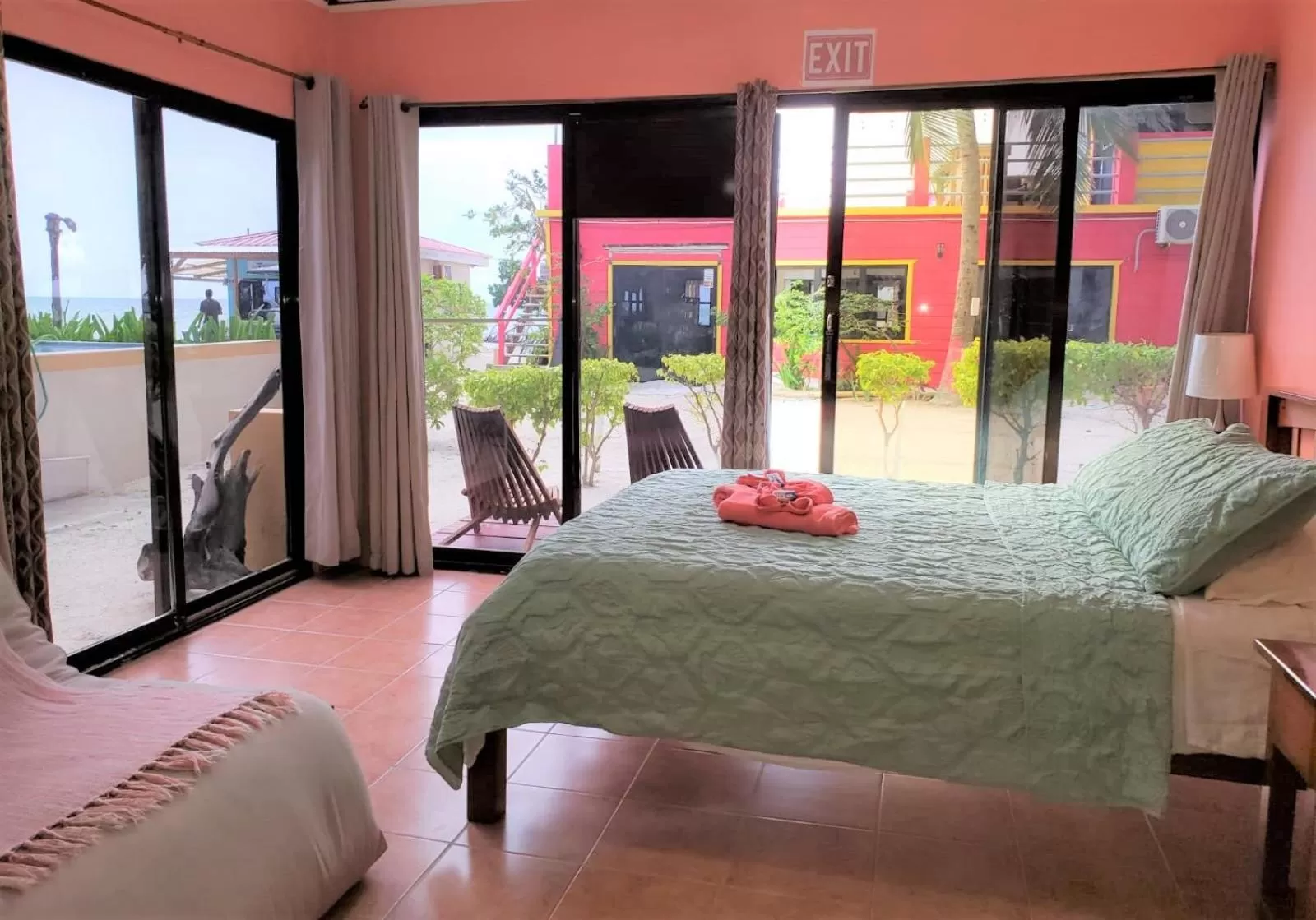 Bed in Beach Side Condos Caye Caulker by CCVH