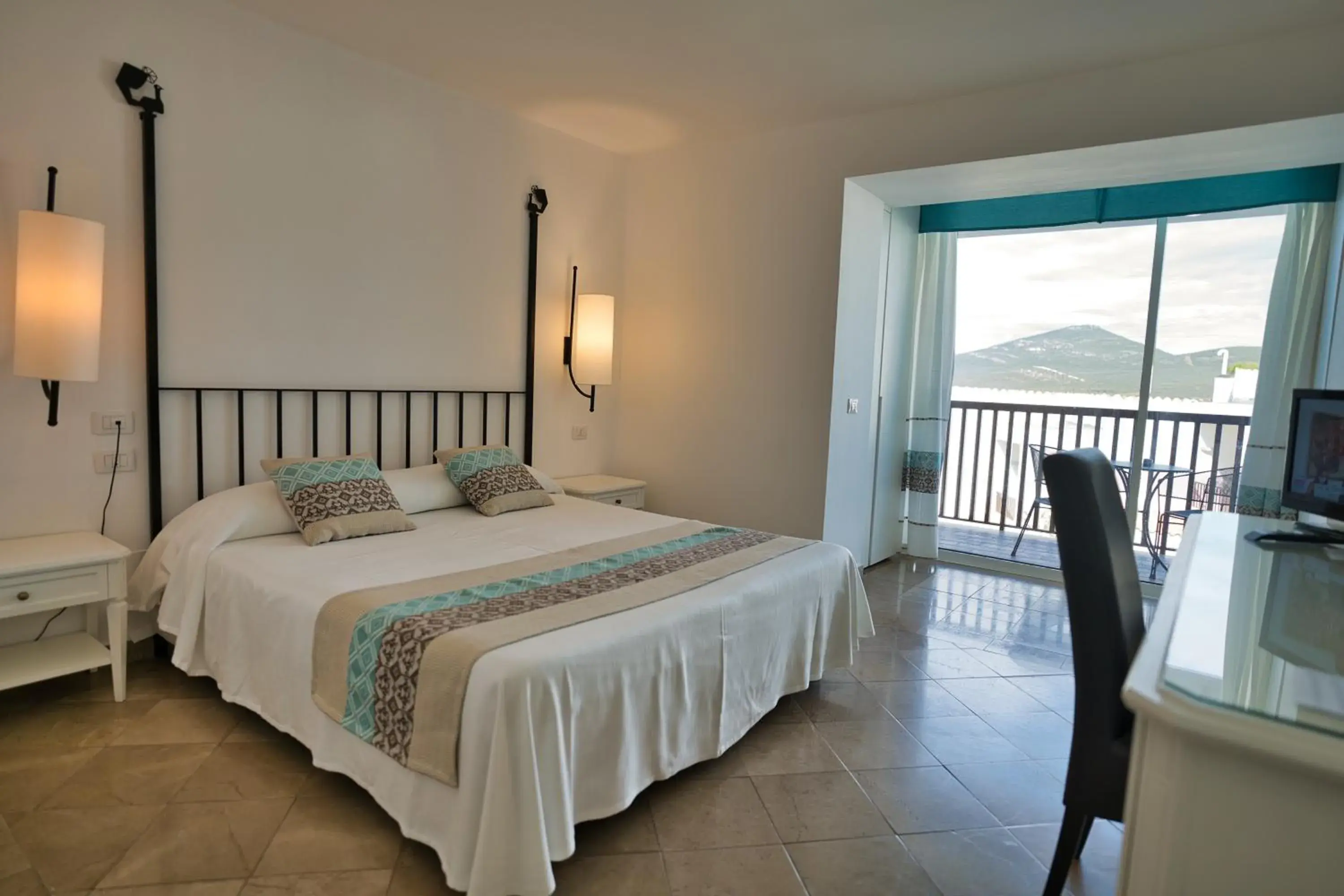 Bed in El Faro Hotel & Spa